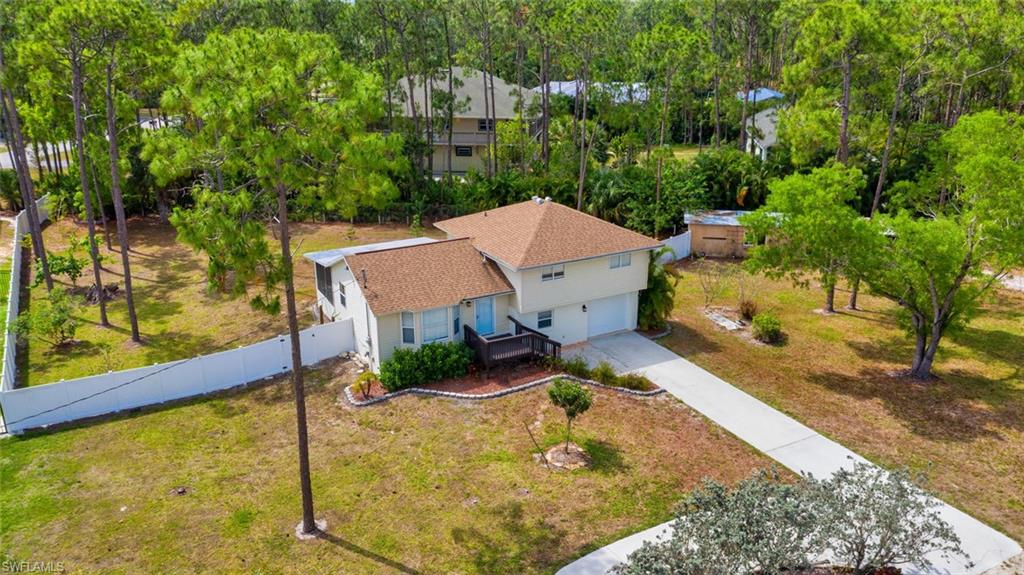 H.15853 - NEW ROOF 2017; all new floors just installed.  3 bedroom plus office home on approx. 1 acre with southern exposure in San Carlos Estates, a private rural community in the heart of Bonita Springs. Property has plenty of room for expansion including a guest house,detached garage for car, boat, RV, jet skis and all the toys. Underground automatic irritation system on well. No HOA fees, within minutes of the sandy beaches at the Gulf,near optimal shopping, dining, and hospitals