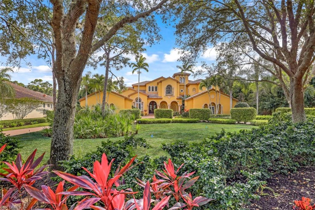 Turnkey Furnished. Amazing one of a kind custom built luxury estate home. This 4 bedroom, 5 bath, Den, 4 car garage home is situated on 3/4 acre with Southern exposure backing up to Spring Creek preserve. Stunning front entry with 12' Cantara iron and glass front doors, entering into the Grand Living room with 21' coffered ceilings, travertine floors, Yamaha piano, formal Dining room with dual sided flagstone gas Fireplace and French doors to large pool deck. This 2 story luxury estate home has Master suite and one guest bedroom suite on first level and 2 add'l Guest bedroom suites on 2nd level with Entertainment room and 2nd floor balcony to enjoy an evening glass of wine. Gourmet Kitchen with Viking 6 burner gas range, SubZero refrigerator, with copper farmhouse sink and island with copper prep sink, desk in Pantry, and Butler's Pantry. Family room has gas Fireplace and drop down projector screen . The Master suite has tray ceiling with custom millwork, two customized walk-in closets, Spa like bath with his & her vanities, jetted tub and walk around shower. This is a Smart Home with Lutron lighting, sound system throughout and controlled with your phone. Outdoor Kitchen .