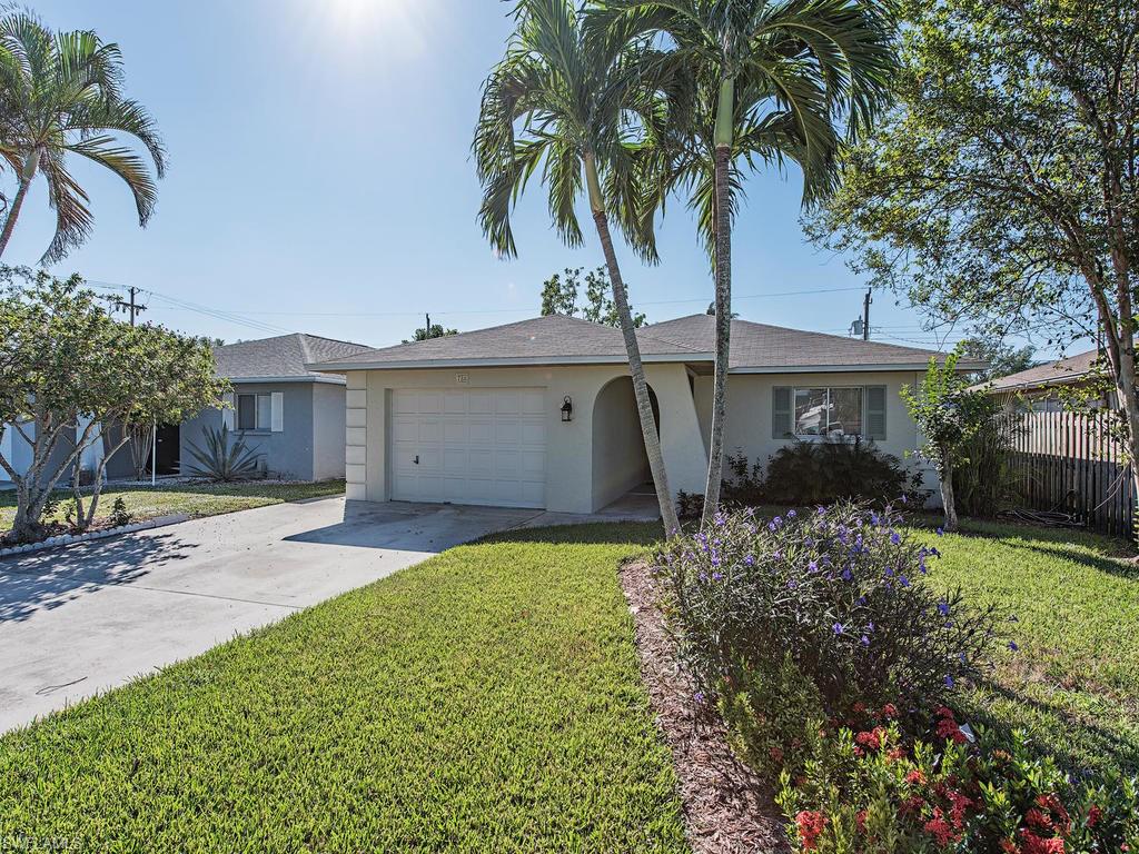 H.12433 - This beautifully renovated home features an open floor plan perfect for today's lifestyle!  Wonderful open kitchen design with large custom center island, high end stainless appliances, granite counters, subway tile backsplash, under counter lighting & beverage cooler. Spacious master bedroom boasts large walk-in closet and private bath.  The main living areas feature neutral diagonal tile floors and recessed lighting. The large (approx. 200 sq. ft.) tiled, covered patio could easily be screened or incorporated into a future pool area.  Extra wide driveway and oversized single car garage.