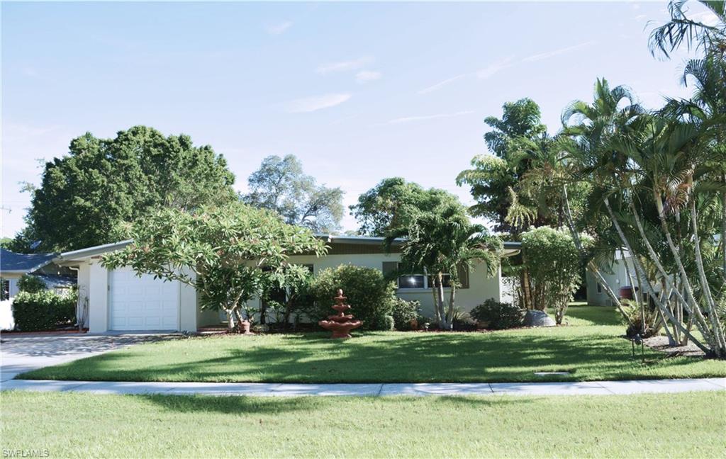 The Caloosahatchee River is at the end of the block! Charming single story completely updated…new roof 2017, new updated electrical panel and Service Amp, new A/C, all with a fantastic private fenced backyard.  Enjoy the spacious lanai plus an additional paver patio area for enjoying the amazing yard with mature fruit trees ~ Great for Entertaining!  Large family room and formal dining, open kitchen large enough for a table and chairs.  Private office area (or could be renovated for a third bedroom).  Two full baths and A/c garage (Space with closet that could be converted into 4th bedroom or bonus room)- perfect for storing anything!  Highly desirable McGregor Corridor, Walk to town and Ford Edison Estate.  Close to schools and shopping. A Must See!