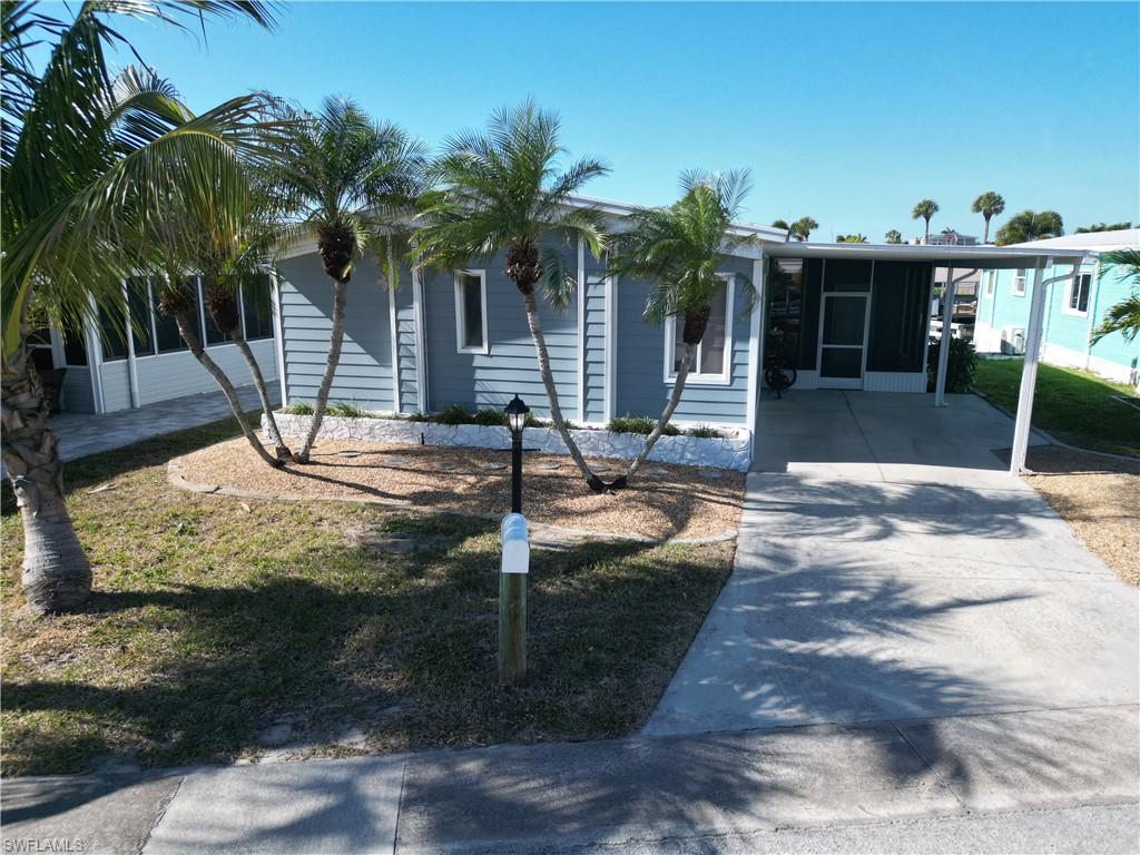 There could not be a better time to buy in Bayside Estates.  The market hit rock bottom several months ago and as we start the new year, sales are just beginning to pick up.  Prices are competitive and inventory is high so there is something for sale to satisfy nearly everyone.  If you’ve been on the sidelines waiting for the opportunity to buy your full-time or vacation home in Bayside Estates, now is the time to get back in the game.  This fully remodeled home boasts two bedrooms and two baths, with a large kitchen and dining area for entertaining.  The kitchen has custom tile back splash, granite countertops and stainless-steel appliances.  The family room blends seamlessly into either the kitchen and dining area or the Florida room which has great views of the backyard and canal.  Both bathrooms have custom tile work and either granite or quartz countertops.  Even the lighting is of designer orientation.  
Bayside Estates is the best kept secret of Fort Myers Beach. This incredibly active and friendly 55+ community is the crown jewel on the gulf coast. Bayside estates is only 2.5 miles to the beach and is accessible by either car or boat--right from either your driveway or private boat dock. A very popular activity is riding your electric bicycles to the beach for the day and visit the world-famous Jimmy Buffett’s Margaritaville. Just don't step on a pop-top!! Nearly all the major retail vendors are within a very short driving distance for ultimate convenience. For those who don’t know a lot about Bayside Estates, it is a very fun place to call home---some would even say it’s a mature person’s playground. Whether you want to play pickleball, tennis or bocce ball, hang out at the community pool, skinny dip in your private pool or simply cruise the hood in your swanky golf cart, there is always something going on around here. People are friendly and you will be warmly welcomed.