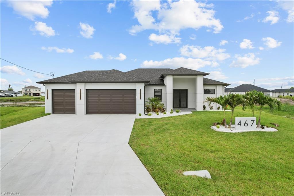 **City Water and Sewer Installed** Welcome to this stunning new construction waterfront home offering 4 bedrooms, 3 bathrooms, and a spacious 3-car garage with over 1,900 square feet of thoughtfully designed living space. Built with both luxury and functionality in mind, this open-concept residence showcases exceptional craftsmanship and high-end finishes throughout.
The heart of the home features a beautifully designed kitchen with custom cabinetry, premium finishes, and ample storage, seamlessly flowing into the expansive living and dining areas. Custom cabinetry extends throughout the home, including all closets, providing both elegance and organization.
The spacious primary suite offers a private retreat with a luxurious en-suite bathroom, while the additional bedrooms provide comfort and flexibility for family and guests. Enjoy the warmth and ambiance of a stunning indoor fireplace, creating the perfect focal point for the living area.
Step outside to your private waterfront oasis overlooking an oversized freshwater canal. A brand-new seawall is already in place, offering peace of mind and the perfect foundation for enjoying the waterfront lifestyle. Relax in the sparkling saltwater pool or entertain year-round in the fully equipped summer kitchen. The outdoor living area is further enhanced by a beautiful outdoor fireplace and comes complete with TVs already installed and connected, making it ideal for hosting family and friends.
Combining modern design, custom finishes, exceptional outdoor living, and prime freshwater canal frontage, this new construction home offers the ultimate Florida lifestyle. Schedule your private showing today and experience everything this remarkable property has to offer.