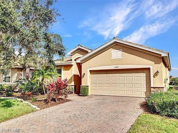 Welcome to the prestigious Moody River Estates gated community! This move-in ready residence offers breathtaking lakefront views and is conveniently located just a short drive from downtown Fort Myers. As you step inside, you'll be greeted by an inviting open floor plan with high ceilings, accentuated by elegant crown molding. The spacious eat-in kitchen is perfect for both casual meals and entertaining, and it has been thoughtfully updated with brand new interior paint and carpet, providing a fresh and modern feel throughout. Outside features paved screened lanai, where you can relax and enjoy the serene lake views. For added peace of mind, this home is equipped with accordion shutters and roll-down shutters. Moody River Estates boasts a wealth of resort-style amenities, including a clubhouse, a luxurious pool, a state-of-the-art fitness center, tennis courts, a billiards room, a basketball court, and a children's playground. Additionally, residents have access to a private community boat launch with Gulf access, perfect for boating enthusiasts. Don't miss this incredible opportunity to live in a community that offers an unparalleled lifestyle.