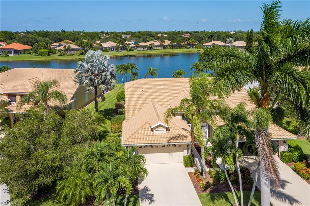 Located in the heart of Lely Resort, this charming, updated home with a newer roof is waiting for you!! This is a lakefront property with a southern view! The roof was installed in 2021! This is one of the larger lots in  Palomino Village and more than double the size of most lots in this subdivision. Newer appliances and new water heater with updates throughout! Quartz countertops in the kitchen and bathroom! Resurfaced garage floor, driveway and lanai!! The home was completely re-piped! Low association fees! Owners are not required to be members of the players club. Beautiful French doors in the master bedroom and pocket sliders allow you to catch the winter breeze!! Less than a 1 minute walk to the community pool!! Located just minutes to shopping, grocery, restaurants! Located to a quick drive to Naples beaches or Marco Island beaches!!