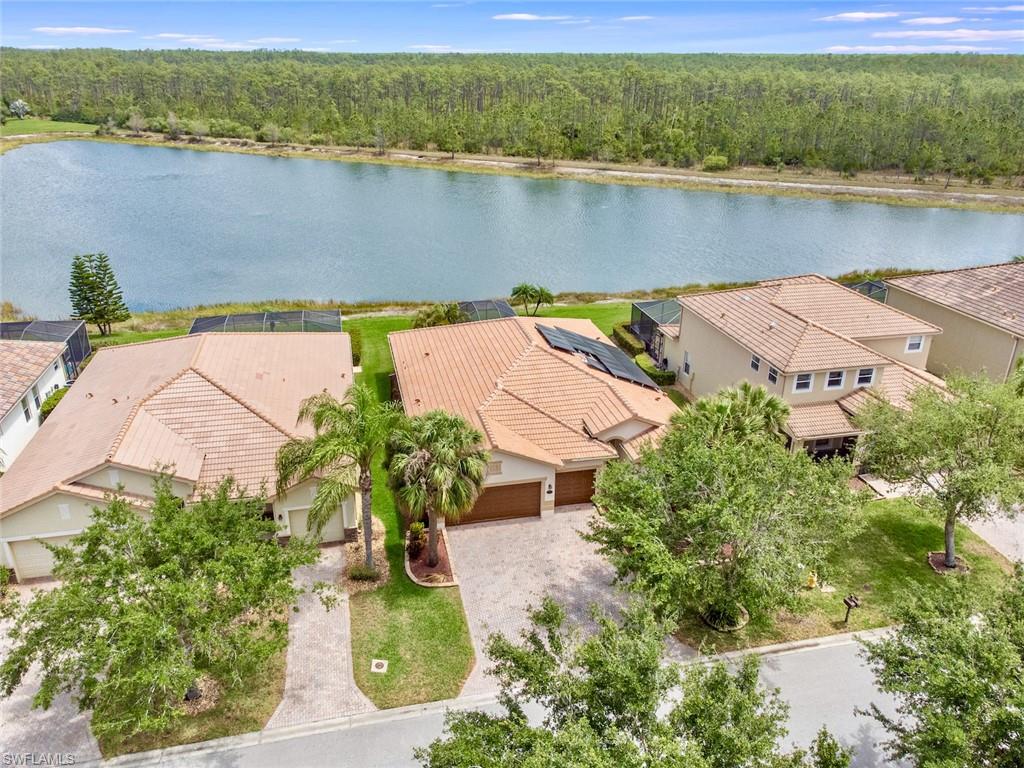 Approx. 2300 quality square feet with a highly desired great room layout, 3 car garage, crown molding, upgraded baseboards, whole house solar system, New Roof, New A/C and Exterior paint job all in 2021, 
tiled flooring in the main living areas with hardwood floor in the bedrooms, huge island-style kitchen, the list goes on!! Each section of the home having it's own private bath. This premium lot offers plenty of privacy, an extended lanai and a gorgeous lake and preserve setting. (*Ask for details on actual number of days on market, property was under purchase contract for majority of days on market shown.) Bella Terra has amenities galore with some of the lowest HOA fees around. Nestled on 999 acres with half the community dedicated to lakes/preserves and home to a variety of native Florida wildlife. Features a Resort-style Clubhouse, 24 hour fitness center, activities for all ages, resort-style pool and spa, shaded children's play area, tennis courts, pickle ball, bocce ball, sand volleyball, multi-use sports fields, tranquil butterfly garden, exercise trails and more. Call Today!