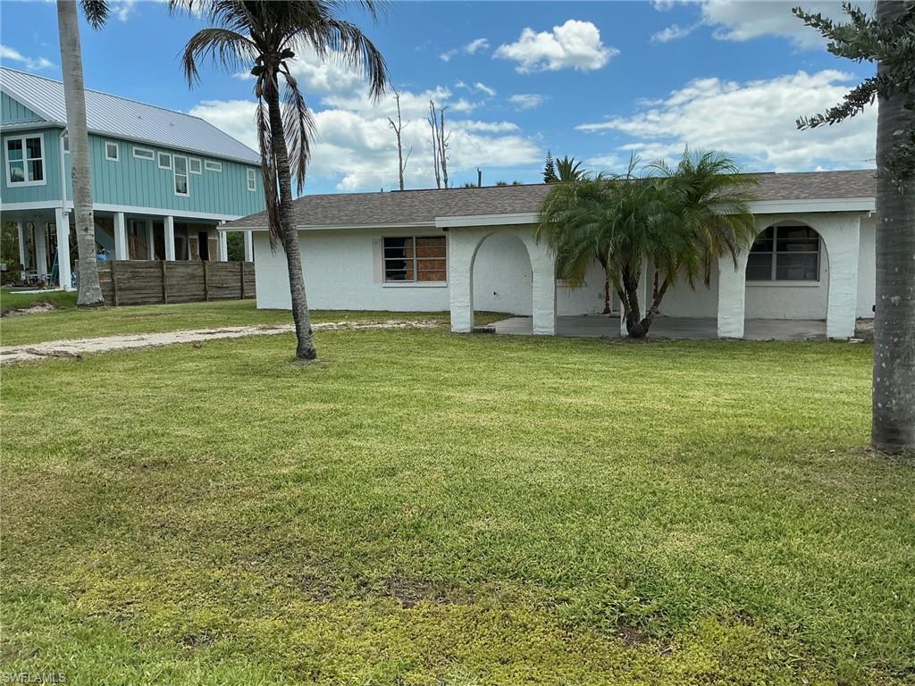 Investors and owner-builders take note. Rare opportunity in the Iona/McGregor corridor. Minutes to Sanibel Island and Fort Myers Beach. This 1974 concrete block ranch is sold strictly as-is, but the expensive structural work is already done: shingle roof in great condition, full post-Ian repipe completed and ready to connect, interior demoed to studs and slab giving you a clean canvas. Pool holds water, needs equipment.  Brand new beautiful home built just next door. No HOA, AG-2 zoning allowing flexibility, RV access/parking, oversized 8x12 shed with electric and hurricane straps, new roof.