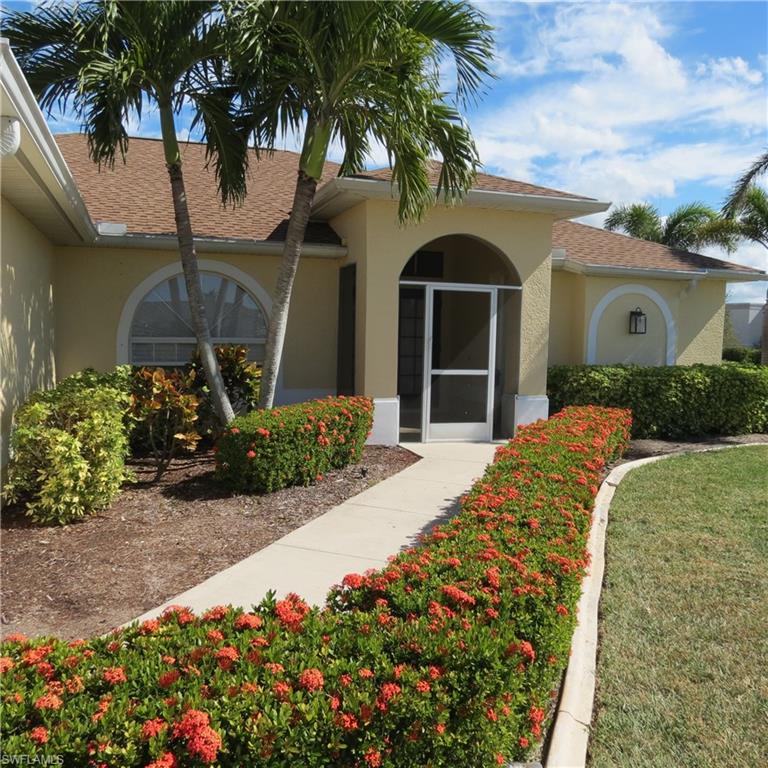 Well-maintained and spacious 4-bedroom, 2 1/2-bath home offering approximately 2,048 square feet of living area on a fenced corner lot with mature tropical landscaping. The home is connected to city water, sewer, and irrigation, with no utility assessments. Major updates include a new shingle roof/re-shingle in June 2023, new A/C in 2024, new 50-gallon water heater in 2022, and professional exterior paint in November 2023.

The home features a desirable split-bedroom floor plan, with tile flooring throughout the main living areas, laminate flooring in the bedrooms, a family room, formal dining room, and formal living room. The kitchen offers ample cabinet space, a tile backsplash, and stainless-steel appliances. The master suite features a tray ceiling, his-and-hers walk-in closets, and sliding doors leading to the screened lanai, which includes an additional half bath and outdoor shower. The master bathroom includes dual sinks, a separate tub, and a walk-in shower. Additional features include an interior laundry room with laundry tub and manual storm shutters.  Home is being sold as-is with right to inspect.