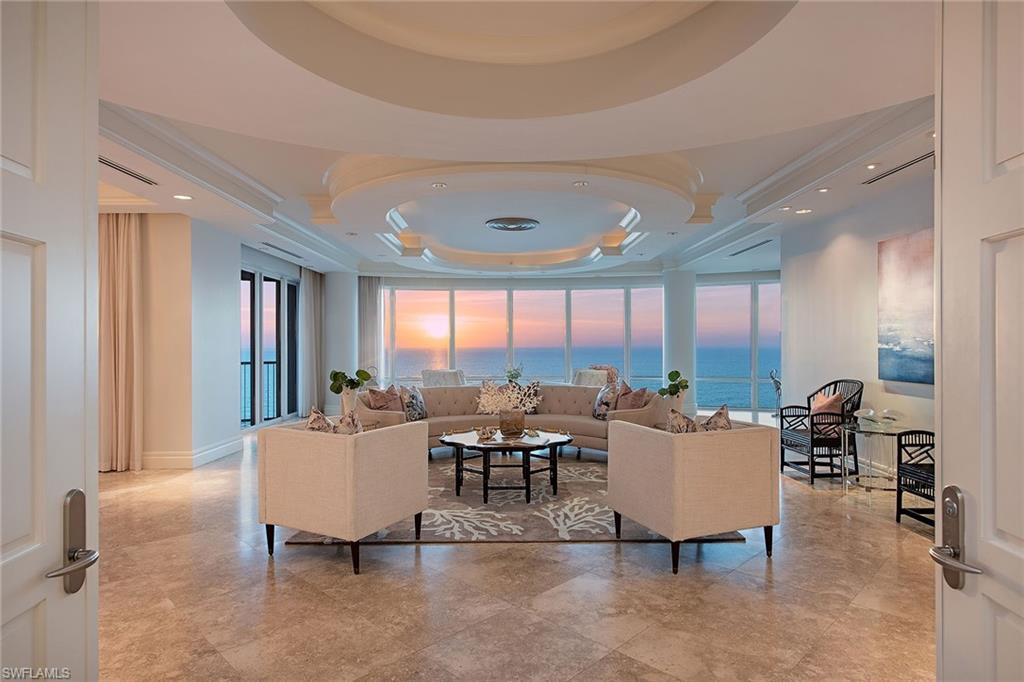 Enter this top-of-the-world 20th-floor residence from a private secured elevator lobby and step into the lap of luxury. You will be surrounded by dazzling long coastal vistas of the azure blue Gulf, the sparkling Venetian Bay and city lights at night. The expansive floor plan, with over 8,200 square feet, has been completely refreshed including new paint and carpet. These updated spaces have room for every aspect of beachfront living and include large living, dining and family rooms as well as multiple screened lanais, one of which has an outdoor bar and grill. Other living areas include two guest suites, two offices and a flex space with a full kitchen, large bath and exercise room. The generous master suite is complemented by dual baths and three large walk-in closets. The gourmet kitchen area has incredible gulf to bay views and features a sunny breakfast space, butler’s pantry and bar, a wine cooler, ice maker and refrigerated drawers. Car enthusiasts will appreciate the three parking spaces in the garage including an electric car plug-in. The ultra-exclusive Regent has a suite of amenities shared by only 37 residences.