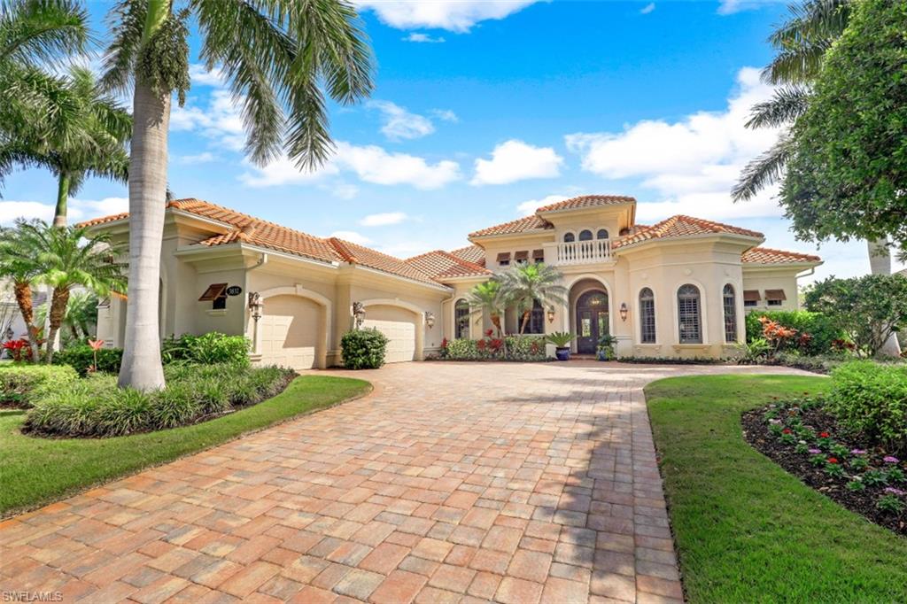 Gorgeous Stock home, located in the prestigious gated neighborhood of  Isla Del Sol  This 4 Bedrooms plus a den 5 and half baths.4224 sq ft home has grand open foyer, features travertine tile, soaring coffered, beamed & tray ceilings  Beautiful open kitchen with walk in pantry, a butlers pantry and wine room.  This home is ideal for entertaining and offers an incredible oversized lanai with a fireplace and resort style pool and spa, all with beautiful golf course views on #12 of Rookery Golf Course  Home has an abundant of landscaping and privacy. Hurricane screens and mosquito misting system.  Enjoy unsurpassed amenities: club & spa, fitness center, resort-style pools, tennis, pickleball and dining. Optional golf, beach and marina memberships available.  Located minutes to beautiful Marco Island and downtown Naples!