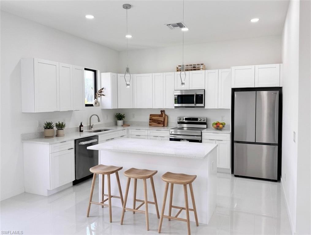 Experience modern comfort and easy living in this beautifully corner lot home located in a highly desirable community. 
Designed with an open-concept layout, the interior feels bright and spacious thanks to high ceilings and generous natural light—perfect for everyday living and hosting guests alike. 

The home features 4 well-appointed bedrooms and 3 bathrooms in a split layout that offers both privacy and functionality. The kitchen showcases a clean, contemporary style with quartz countertops, sleek cabinetry, and stainless steel appliances, seamlessly connecting to the main living and dining areas. 

The primary suite offers a peaceful escape, complete with a walk-in closet, dual vanities, and a stylish glass-enclosed shower. Durable tile flooring runs throughout, and impact-resistant windows add an extra layer of security and efficiency. 

Step outside to a beautiful patio—ideal for entertaining or unwinding in your own outdoor space. A two-car garage and paved driveway add everyday convenience. Ideally located near shopping, dining, and essential services, this home combines practicality with modern appeal. 

Schedule your private tour today and see all it has to offer!