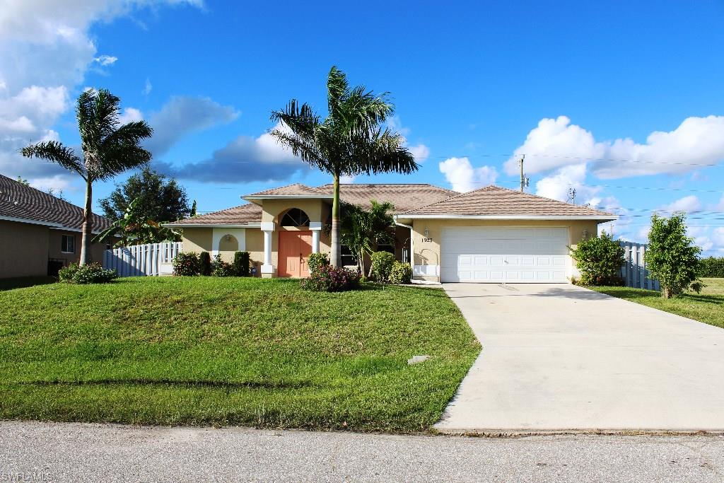 Beautiful home conveniently located close to Diplomat Parkway with easy access to Fort Myers. Three bedroom two bath home in NE Cape Coral. Granite counters in the kitchen. Tiled floors in kitchen, dining room, living room and bathrooms, wood/laminate flooring in the bedrooms.  Screened Lanai, fenced backyard with above ground pool.  Come and request a private showing today!