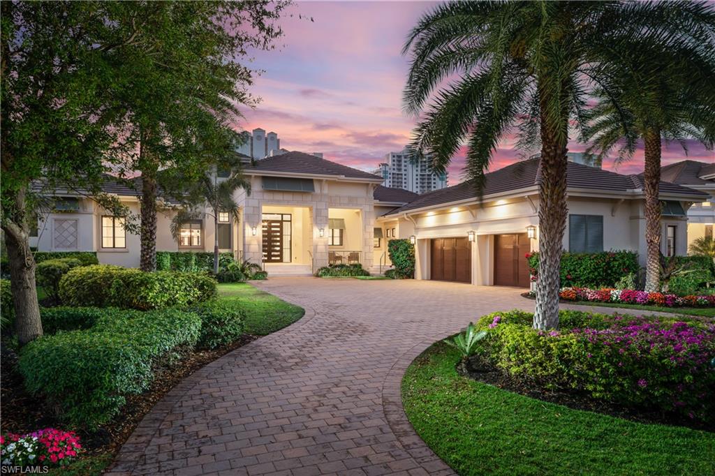 A rare opportunity in the coveted Baywoods II neighborhood in Bonita Bay.  This exquisite custom luxury model home was built by Stock Homes in 2016.  4 BR+Den/4 Full Baths - 2 Half Baths and 4,555 square feet under air, this Savannah model home has many premium upgrades.  Designed by award-winning R. G. Designs, with interior by SOCO Interiors.  Winner of the coveted Sand Dollar Awards when built--Product Design of the Year and Interior Design of the Year.  State-of-the-art kitchen, featuring premium appliances—Sub Zero refrigerator, Wolf appliances and two large islands.  You and your family and guests will enjoy the open floor plan with very generous Great Room, Kitchen and Dining areas that flow seamlessly to a magnificent outdoor pool and entertaining area.  Large heated pool/spa and outdoor dining, and gas BBQ grill.  Each guest bedroom has a full bath en suite.  Oversized 3-car garage.  Offered FULLY FURNISHED with designer interior and furnishings.  Move-in ready.