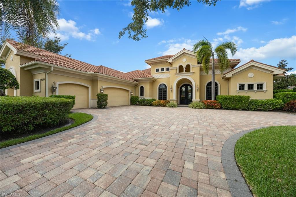 One or more photo(s) has been virtually staged, AI generated or rendered.  Experience breathtaking western views over your private heated pool, the championship golf course, and tranquil lake offering an extraordinary backdrop for Southwest Florida's spectacular sunsets. The beautifully appointed lanai is designed for exceptional outdoor living, featuring an outdoor kitchen, inviting covered gathering spaces, and seamless indoor/outdoor entertaining.
Offering more than 4,270 square feet of air-conditioned living space, this exquisite residence features four en-suite bedrooms, a private den, and an elegant blend of formal and casual living areas. Every detail has been thoughtfully crafted to create a home that is equally suited for grand entertaining and comfortable everyday living.  The spectacular double glass-door entry welcomes you into a stunning foyer with tumbled marble flooring, setting the tone for the refined finishes found throughout the home. Coffered ceilings, custom architectural details, and timeless craftsmanship enhance every room.
The private primary suite is a true sanctuary, occupying its own wing of the home and offering exceptional comfort and tranquility. A split-bedroom floor plan ensures privacy for family and guests alike.
The chef's kitchen is both beautiful and functional, showcasing dual islands, abundant custom cabinetry, and a generous walk-in pantry. It flows effortlessly into the spacious family room, where expansive glass doors open to the lanai, perfectly framing the captivating golf course and lake views.
Formal living and dining rooms provide elegant spaces for entertaining, while a striking fireplace creates warmth and sophistication. A centrally located wet bar with a beverage refrigerator further enhances the home's entertaining appeal.  Additional highlights include hurricane rated windows and sliding glass doors, providing peace of mind and effortless enjoyment of Southwest Florida living. 
A transferable House Membership is available, providing access to the unparalleled lifestyle of Quail West, one of America's Platinum Clubs. Residents enjoy an award-winning culinary program, a full-service luxury spa, state-of-the-art fitness center, tennis, pickleball and bocce courts with covered spectator seating, a playground, and vibrant social spaces designed to cultivate lasting friendships and an exceptional lifestyle.