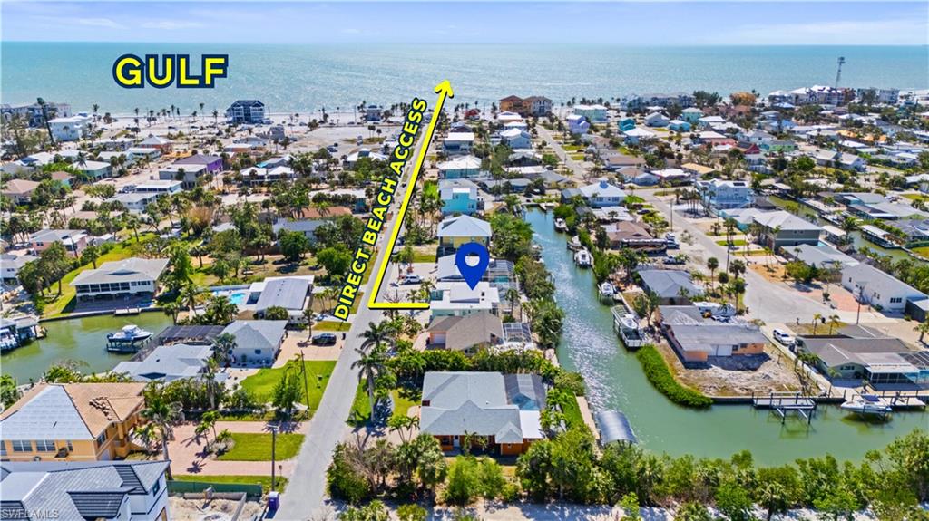 LOWEST PRICED CANAL-FRONT POOL HOME ON DIRECT BEACH ACCESS! Perfectly positioned near the historic Mound House and just steps from beach access, this fully renovated 3-bedroom, 2-bath coastal retreat offers the ultimate blend of Florida charm, location, and lifestyle. Featuring direct Gulf-access canal frontage, this move-in-ready home is ideal for boating, kayaking, paddleboarding, or simply enjoying waterfront living from your own backyard! Inside, you’ll find a stunning brand-new kitchen with stainless steel appliances, modern finishes, vaulted ceilings, abundant natural light, and beautiful terrazzo flooring that adds timeless character throughout. The desirable split-bedroom floor plan offers comfort and privacy, while the expansive Florida room lives like a second living area and seamlessly flows to the screened lanai and sparkling pool—creating the perfect indoor-outdoor entertaining space. Whether you're searching for a primary residence, vacation getaway, or high-demand investment property, this home checks every box! Prime mid-island location close to dining, shopping, entertainment, and everything Fort Myers Beach has to offer. COASTAL LIVING DOESN'T GET BETTER THAN THIS!