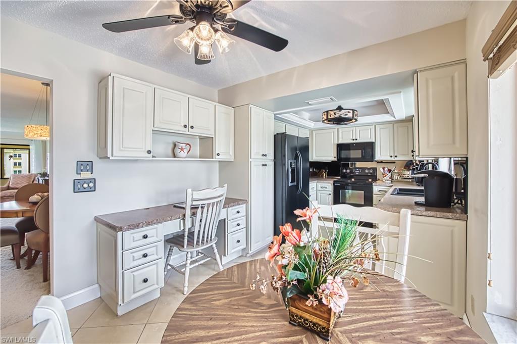 Available to rent NOW through 2027 in the Seven Lakes Golf & Tennis community. Lease Length is negotiable up to 1 Year with a 4-month minimum. Seasonal lease, Jan 1st- April 30th, 2027 is $3,500. per month. Annual Lease is $1995. per month. Elegantly decorated with quality furnishings. TURNKEY-FURNISHED. Bundled Golf Community with Free Golf for 2 Tenants. Carport #23 included. Well maintained 2 Bedroom, 2 Bathroom Condo located on the 2nd Floor. Expansive Tiled Lanai overlooking the 18th green with views of the 1st and 2nd greens. This condo has Storm Shutters on all windows, both Electric and Manual. This Palmetto Floor Plan is Spacious offering 1654 sq ft with 2 Split Master Bedroom Suites. The Main Master has a Walk-in Tile Shower, lighted Dressing Area and large Walk-in closet with pull down Attic Stairs for extra storage. The 2nd Master Suite features 2 large closets. Full size Washer and Dryer in a separate laundry room. The remodeled Eat-in Kitchen features a Pantry with roll out drawers and built in Desk. Large living room and dining room space with Crown Molding and Chair Rail. Lighted Dry Bar. AC is 2023. Hot Water Heater is 2020. Roof is 2023. Extra storage area in Lanai. This condo is located within walking distance to one of the community pools. This Active Adult 55+ Community offers 6 Heated Pools, 6 Har-Tru Tennis Courts, Shuffleboard, Bocce ball, Pickleball, Library Card rooms, Exercise room, Billiards, Wood Shop, Hobbies, Crafts, Cards, Restaurant, Full Time Recreational Area with Dinners, Movies and Dancing Events. 24 hour manned guard gate. Rent includes Bundled Golf, Electricity, Internet Wi-Fi, Cable, Water, Sewer and Trash. NO Golf Transfer fees, NO Golf Green Fees and NO Food Minimum in the restaurant. Centrally located for Dining, Shopping & Beaches! Located across the street from Bell Towers and a short distance to RSW Airport! Security deposit and post cleaning fee collected up front. Tourist Tax of 11.5% is collected on leases less than 6 months. Sorry, no pets and no smoking. Come visit paradise soon!