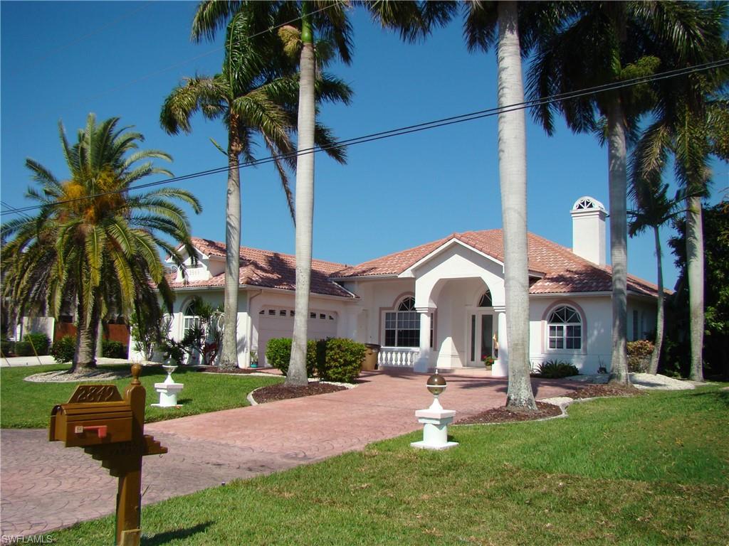 CANALFRONT Home with North Exposure / 200' wide sailboat canal - no bridges / 3 Bedrooms / 3 Baths / Screened Pool Area / Large, electric heated pool with spa and waterfall / Boats dock with 25,000 lbs boats lift and WaveRunner lift / Captain's walk / Tile roof / Assessments PAID / FIRE PLACE in Living Room / BBQ-Grill / Close to shopping and dining, Sanibel Island, Captiva and Fort Myers Beach. House will be sold TURNKEY!