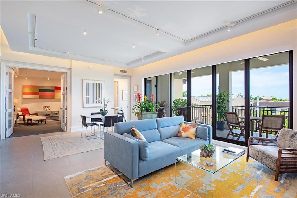 Step into this beautiful, upscale condo in downtown Naples and live the Naples lifestyle you seek just steps off 5th Avenue S. This Naples Square two bedroom plus den, two and one-half bath residence has an unobstructed western view of Naples’ magnificent sunsets from all rooms except the laundry, den and powder room and is loaded with upgrades including: upgraded floor tile, upgraded kitchen appliances, under cabinet lighting, dropped ceiling with track lighting in great room, remote controlled sun shades and frosted glass French doors on the den. Upscale furnishings, negotiable. Enjoy entertaining on your large balcony, exclusive club room, by the pool and spa or by the fire pit in the courtyard on a cool evening. Naples Square residents enjoy a state-of-the-art fitness center, under building parking and secured storage space. All this in a location surrounded by upscale shopping, fine dining, art galleries and entertainment. Walk or bike to Naples pristine white powder sand beach, Baker Park and the Naples Greenway and enjoy endless dining, shopping, theatre, car shows and art shows on internationally acclaimed 5th Ave S. 2 pets no weight limit.