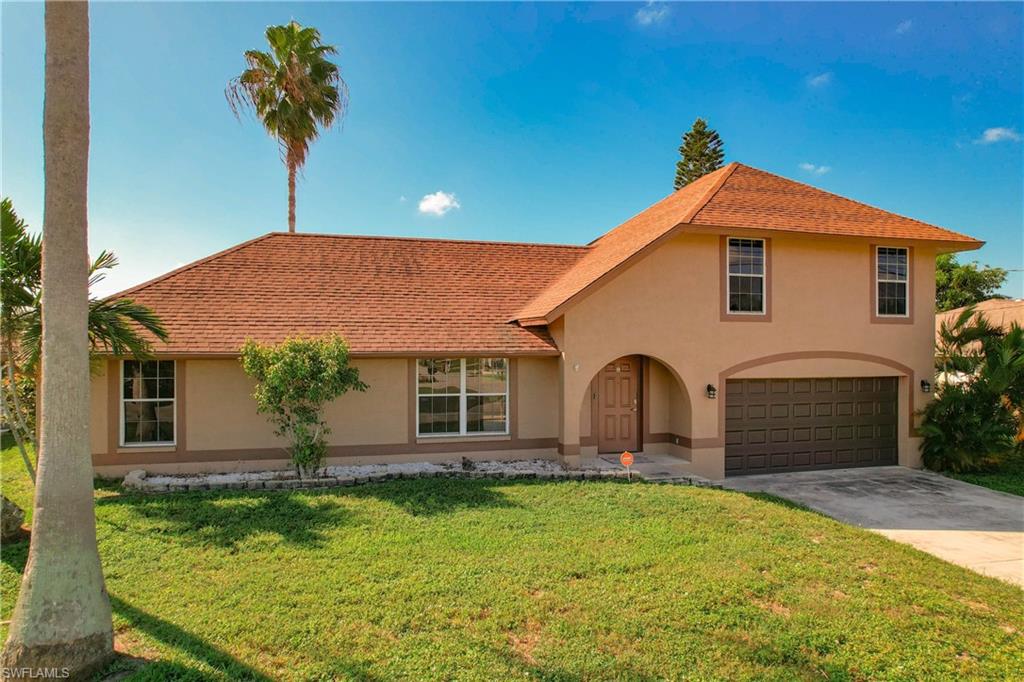 Check out this FRESHWATER CANAL home located in sought after SW Cape. This home features a 3 bedroom / 2 bath open floorplan with a loft. The home is on City water and sewer with ALL ASSESSMENTS PAID IN FULL! Enjoy the high ceilings and open-air feeling of the family / dining area which looks out into the screened-in lanai, large backyard, and relaxing canal view. The spacious kitchen features high ceilings with a ceiling fan, a breakfast bar, breakfast nook, black appliances, and dual pantries. Connected to the loft, the private 2nd-level master bedroom is extra large with high ceilings, and a master bath with walk-in closet and linen closets. The guest bedrooms located on the first floor are also spacious and have all- tile flooring. Relax on the private lanai overlooking the large backyard and wide canal view, with plenty of room to add a pool. Other features include newer A/C (2017), new plumbing (2018), exterior painted (2019), new hurricane-rated garage door (2019), and roof (2005). Located just minutes from shopping, restaurants, Cape Coral Pkwy, and the lower bridge to Ft Myers.