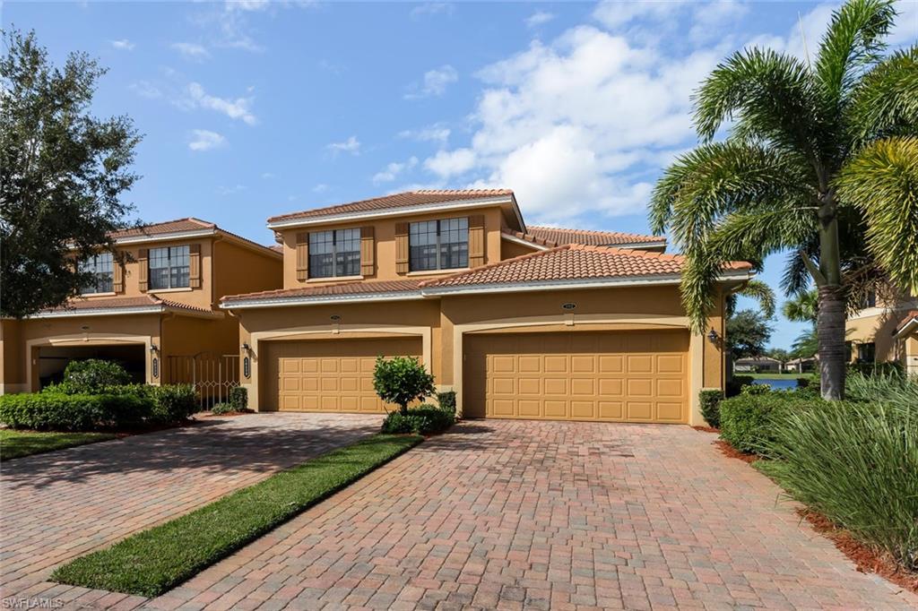 A truly exceptional first floor coach home with a luxury decorator level décor. Quality on display throughout and it is being sold turnkey. Enjoy the scenic wide lake and golf course views with family and friends from the large lanai. Upgrades include crown molding, custom lighting, fans, window treatments, custom paint, granite kitchen counters and a tile back-splash, and 18” tile on the diagonal through the living areas. This is a three bedroom, two bath coach featuring a 2/BR/BA guest wing, a two-car garage, and it is just a few buildings away from the Coach Homes pool. Heritage Bay is a 27 hole bundled golf community offering a resort country club lifestyle at an affordable price. There is a Master Home Association and a condo fee but no membership or initiation fee to join.