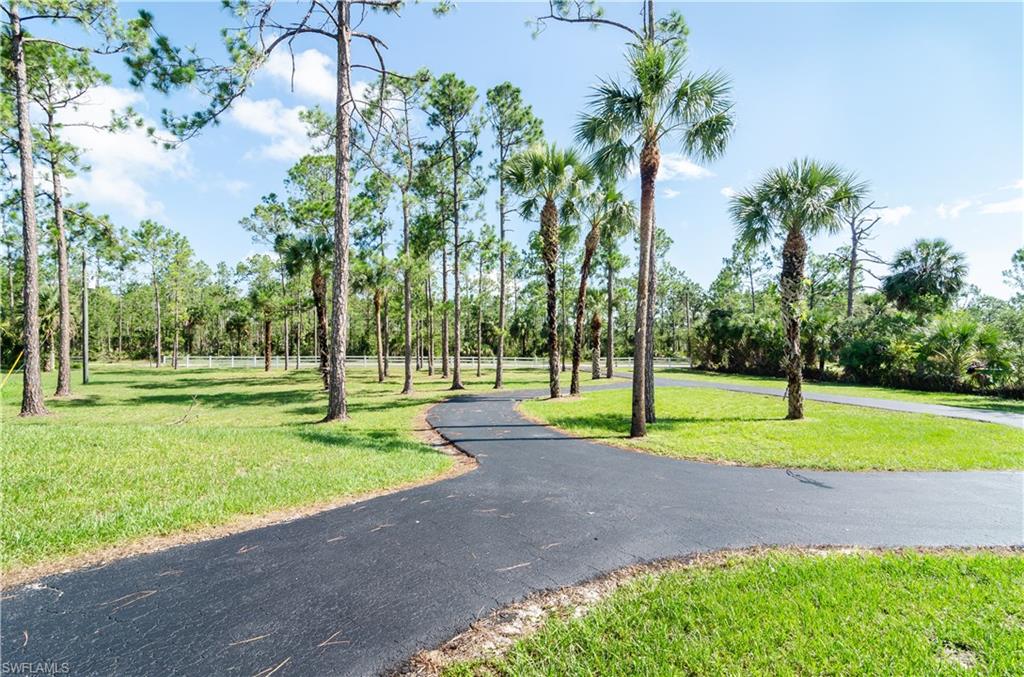 New Roof June 2018! (see attached Collier County Certificate of Completion)
Stainless Steel Appliances!
Enjoy 2.5 acres off of Wilson Boulevard (the last street before Immokalee Road). Plenty of space in the back for a new pool, recreation area or both. High ceiling and split bedroom plan give the home a lot of space. Driveway was recently resealed.