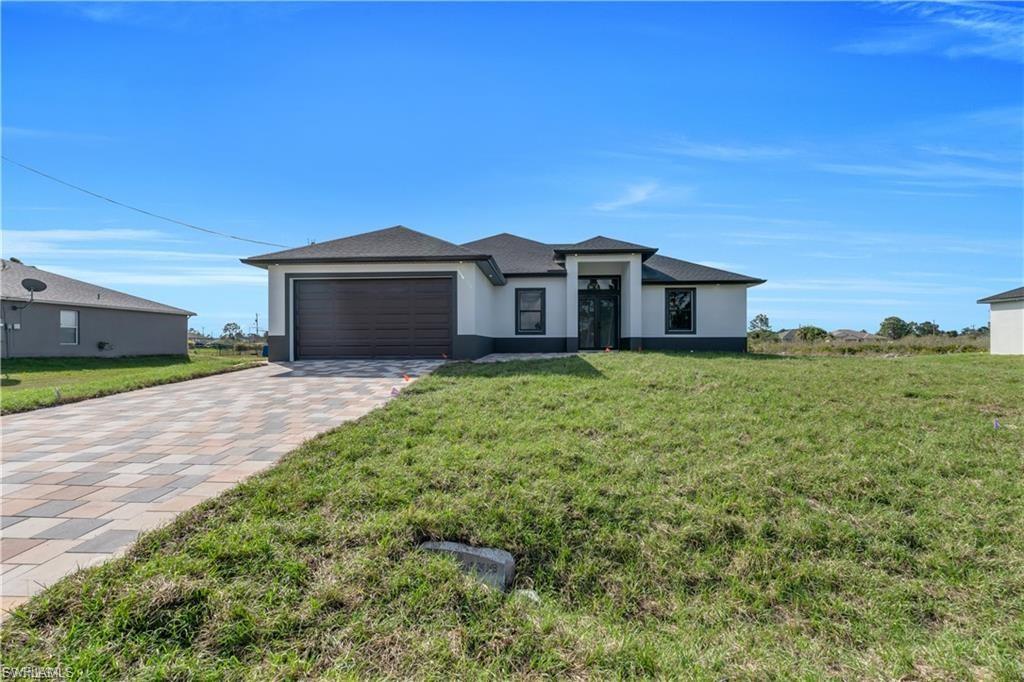 Welcome Home, this luxurious home is just finished. this stunning model is ideally located in a peaceful neighborhood, you will love this bright and beautiful single family home that features an open-concept floor plan 3 spacious bedrooms, plus den/office, and 2 full baths. Master features huge walk-in shower, closets and dual sink, stunning gourmet kitchen, appliances, very expanded lanai to gather family over the weekend.