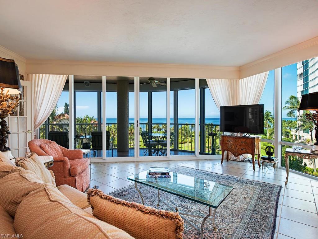C.11998 - Enjoy stunning panoramic Gulf views and breathtaking sunsets from the fifth floor of one of Park Shore’s most desirable high-rises, Le Ciel Venetian Tower. Open, airy and bright with expansive views from every room through floor-to-ceiling glass windows and sliders. This unit faces directly west and offers a spacious 225 square foot, Gulf side terrace with access through the vast living area or the luxurious master bedroom. Split layout floor plan with an en-suite guest bedroom, generous third bedroom and a large master suite with a bathroom fit for a king and queen. The sleek white kitchen with elevated countertops, breakfast bar, and buffet, is perfect for entertaining. Nine foot ceilings, ample closet space and custom crown moldings throughout accent this unit’s new and fresh feel. Additional features include custom window treatments, electric storm shutters, two prime parking spaces in the upper parking garage, two air-conditioned storage units and two brand new air conditioning units.