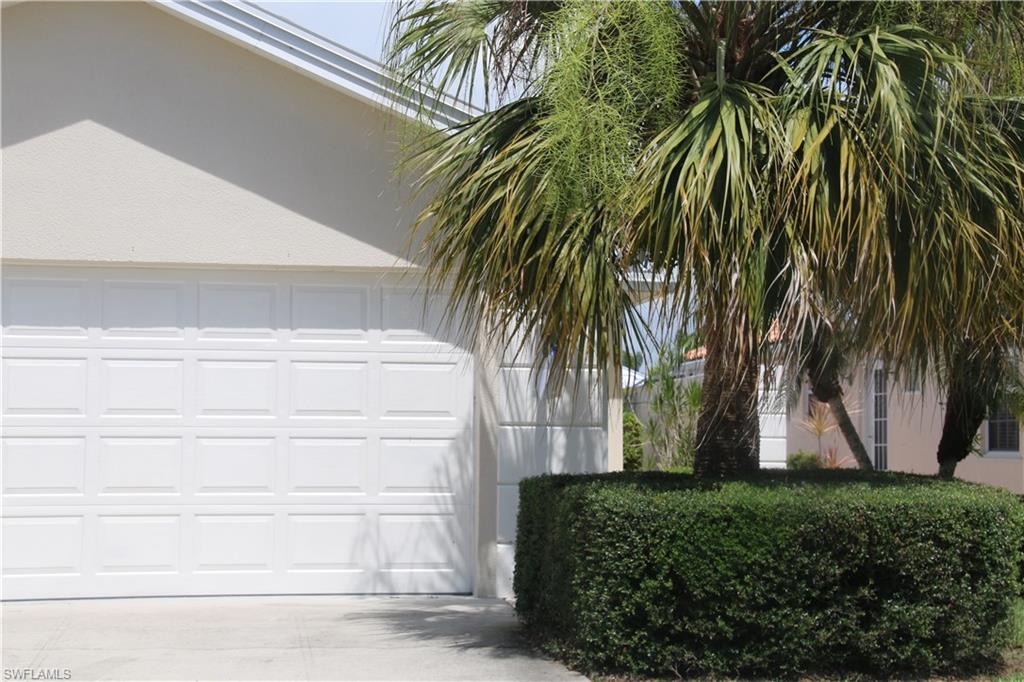 This 3 bedroom 2 bath home is located on arguably one the best streets in VILLAGE WALK...CENTRALLY LOCATED  and AWAY FROM ANY TRAFFIC NOISE, this is one of only a few 3 bedroom attached villas that were built in the community.  It is the LARGEST OF THE 3 BEDROOM REGENT MODELS, with the FULLY FINISHED LANAI AREA (1808 sq ft) as opposed to just the screened in lanai (1648 sq ft).  With PRIVACY WALLS on both sides, and a BIG SCREENED IN DECK with spa, OVERLOOKING THE LAKE, this home is very private and lives like a single family home....This home is being sold as is and needs some fixing up, but it is a solid 3 bedroom home in a great location...The roof is being fully replaced, as opposed to just being repaired, and money has been set aside in escrow for that purpose... Village Walk itself is a great centrally located AMENITY RICH NORTH NAPLES COMMUNITY...You are only @5miles to the beach and @3 miles to upscale dining, shopping and entertainment opportunities such as  Mercato... Southwest Florida International Airport is only 30 minutes away...Zoned for  VINEYARDS ELEMENTARY SCHOOL, NORTH NAPLES MIDDLE SCHOOL, and BARRON COLLIER HIGH SCHOOL...VERY REASONABLE HOA FEES AND NO CDD...
