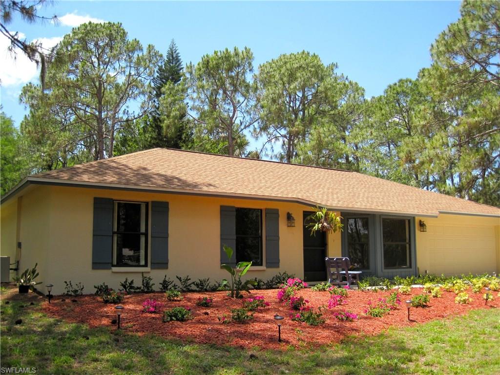 Ready to move right in!  Beautifully updated 3 bedroom 2 bath home on 10 fenced acres.  Newly installed kitchen, bathrooms and tile floors.  Freshly painted inside and out.  Vaulted ceilings in the large family room.  Oversized lanai overlooking quiet, peaceful grounds.  The five stall center aisle barn has electric, water and separate tack room, and two wash racks/grooming areas.   Two fenced paddocks.  Plenty of trees provide shade.  Lots of open space for riding.