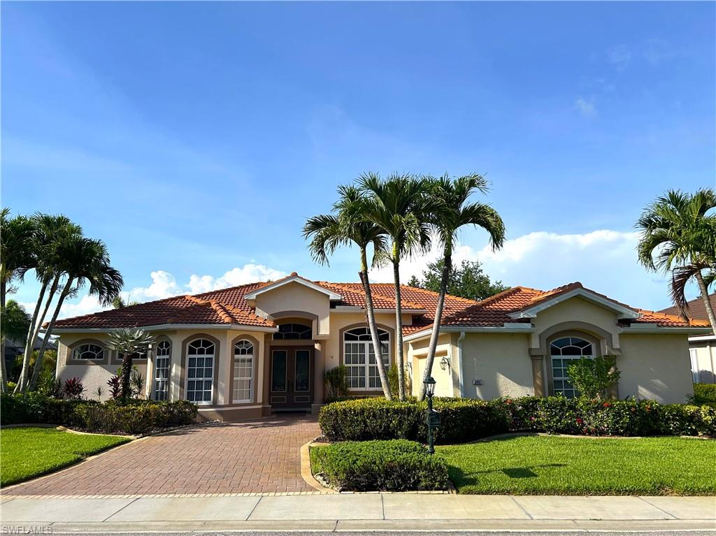 Stunning Starling floorplan estate home in The Sanctuary within Herons Glen Country Club. House-width lanai with recently resurfaced pool overlooks stunning views of a large lake and the award winning Herons Glen Golf Course. This home features a 2023 roof and hot water heater, 2024 hvac, and some newer appliances. You will enjoy the beauty and privacy of the larger lots and larger homes in The Sanctuary, as well as all of the many activities and amenities offered by this active resort-style community!