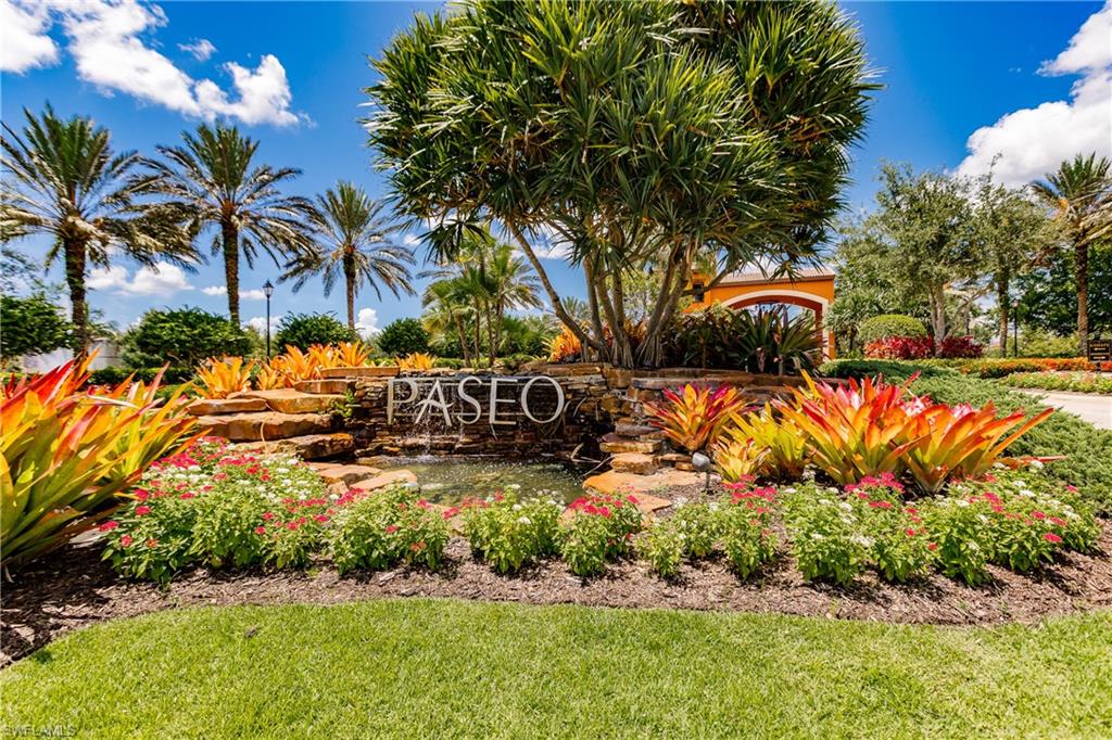 Come and enjoy this bright, airy SAN BENITO condo, built in 2014. This 2nd story "flat" with French doors leading out to 2 Juliet balconies & a SW Architecture flare is easy to maintain with tile in the main living areas & the convenience of split bedrooms and baths. Windows & doors have high impact glass. The oversized one car garage has room for the car & any extra storage space wanted. This corner unit is conveniently located just a short walk to enjoy your morning coffee at the Town Center or afternoon visits to the ice cream parlor.  Any time of the day that short walk also takes you to the 3 resort pools, tiki bar, state of the art Gym (including fitness classes), tennis courts & much more. A movie theater, pickle ball courts , bistro, pub, fine dining, a library & computers are also all offered for your use onsite.  Move-in ready, fully furnished & near the RSW International Airport, numerous shopping & dining facilities & so much more. If you are not yet familiar to all that PASEO has to offer, treat yourself to a quick look at the MyPaseo.com website & you will see why this community has been voted Community of the Year for 9 years in a row.