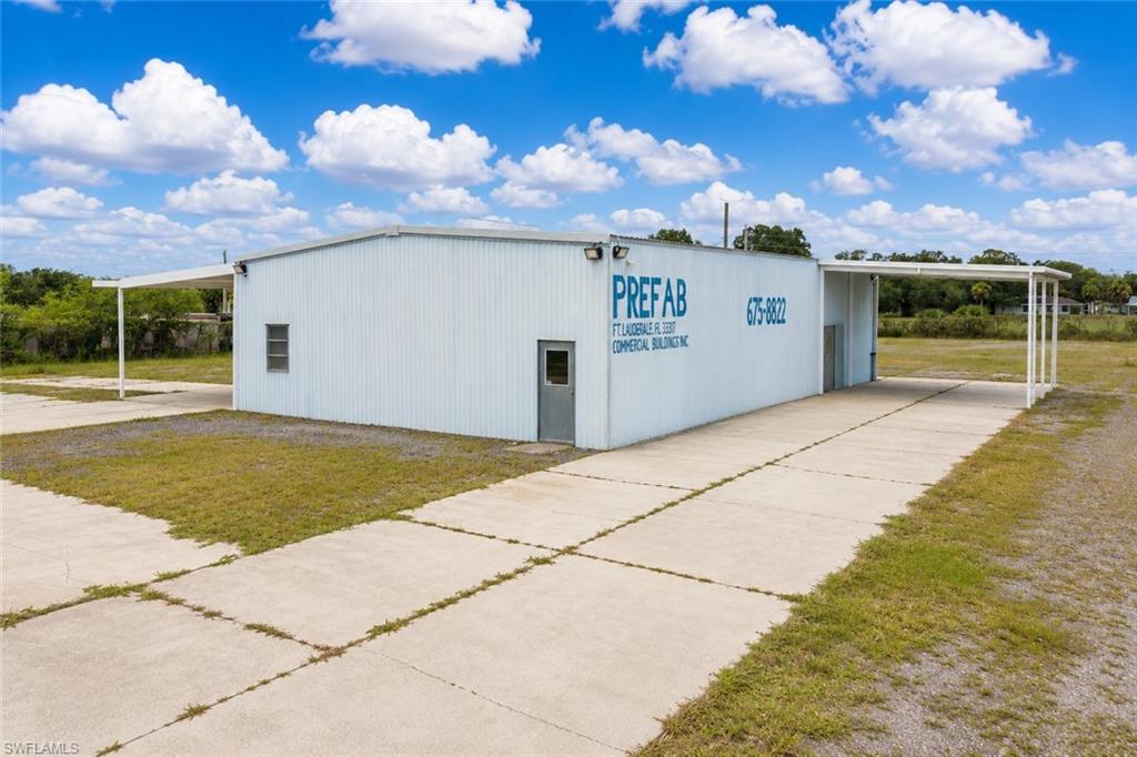 4.65± Acres | Industrial Warehouse | For Sale or Lease | LaBelle, Florida

Position your business for growth with this exceptional 4.65± acre industrial property strategically located just one block south of State Road 80 in rapidly expanding LaBelle, Florida. Offering Light Industrial (I-1) zoning, a 3,224± square-foot steel warehouse, and nearly five acres of fully fenced land, this property provides the flexibility and infrastructure that today's industrial users demand.

Legally authorized for low-impact industrial and commercial applications, the property is well suited for light manufacturing, assembly operations, product warehousing, wholesaling, and logistics or distribution facilities, making it an outstanding opportunity for owner-users, investors, contractors, suppliers, and expanding businesses.

The warehouse features a functional layout with multiple overhead doors, covered loading area, mezzanine storage, office space, restroom facilities, city water and sewer service, and expansive concrete aprons designed to accommodate commercial vehicles, trailers, and equipment. The large fenced yard provides secure outdoor space with excellent circulation for trucks, fleet vehicles, material handling, and future expansion.

Unlike many industrial properties that are constrained by limited yard space, this site offers approximately 4.65 acres of usable land, allowing room for operations, storage, employee parking, equipment staging, or future improvements. The property's excellent ingress and egress make it ideal for tractor-trailers, construction companies, transportation businesses, distributors, and industrial service providers.

Conveniently located near LaBelle Municipal Airport and approximately 28 minutes from Airglades International Airport, the property also offers quick access to Fort Myers, Naples, Clewiston, Immokalee, and Florida's east and west coasts, creating an outstanding regional distribution location.

Whether you're looking to relocate your business, expand your operations, or acquire a high-demand industrial investment, this versatile property offers exceptional value in one of Southwest Florida's fastest-growing commercial corridors.

Offered For Sale: $1,300,000
Also Available For Lease: $9,000 per month

This is a rare opportunity to own or lease a move-in-ready industrial facility with significant fenced acreage, excellent transportation access, and zoning that supports a broad range of industrial and commercial operations in the heart of Hendry County's growing business market.