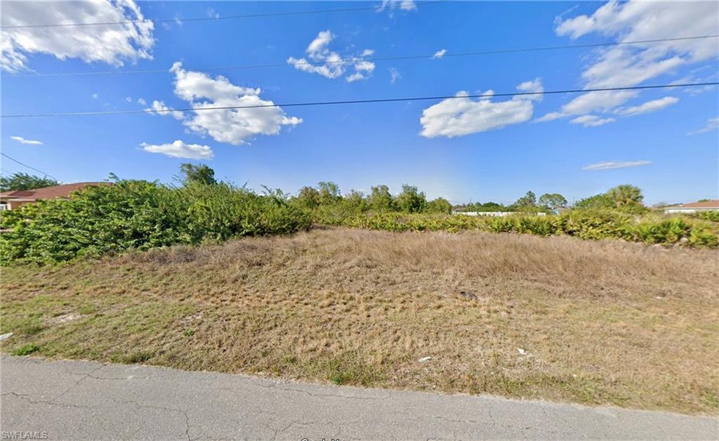 What a fantastic opportunity to purchase a great oversized lot in the booming SW area of Lehigh! Electric pole right out front for easy connection. Naturally mostly clear and has no large trees to remove! Located with quick access to Fort Myers via SR-82, just minutes from Wal-Mart, restaurants, schools and much more! Call today to snatch this up before someone else does! Seller also has another lot located in the SW right up the street, put together a package deal.