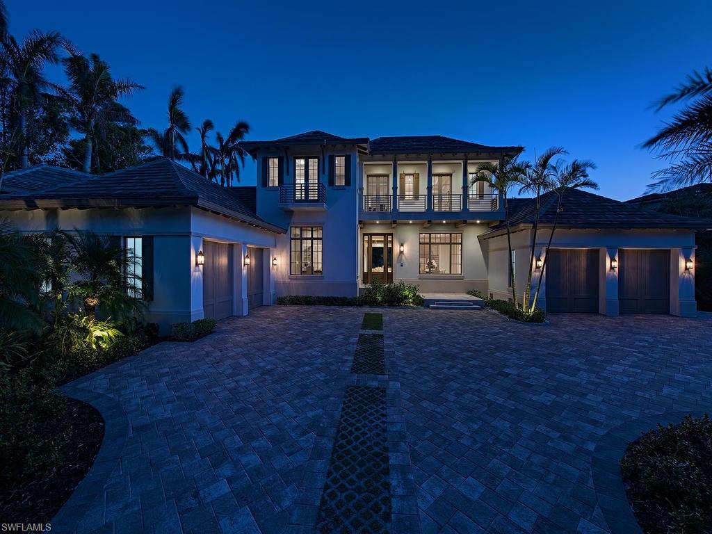 Exceptional value, new construction in Port Royal. Enjoy the Port Royal Lifestyle with its beachfront dining, health club, and spa. This beautiful custom home, with architecture by Stofft-Cooney Architects and interior design by Ficarra Design, is being offered fully furnished.  Disappearing walls of glass, seamlessly blend the interior and outside living areas. Gourmet kitchen with two islands, dining room with stunning wine wall, outdoor kitchen, pool, spa, and beautiful lake view.  Master suite has 2 large walk-in closets.  Master bath with exquisite 24" dolomite marble has separate custom shower and tub.  Large lot with a 4 Car garage.