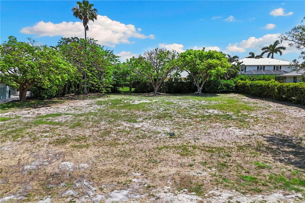 Welcome to the Tigertail Beach area of Marco Island, a sought-after destination for those seeking the ideal blend of tranquility and convenience. This stunning 0.25-acre residential lot offers an exceptional opportunity to create your dream home in a peaceful neighborhood setting. In a quiet community, you'll experience the serenity and relaxation that island living provides. Just minutes from beautiful sandy beaches, and the vibrant Esplanade shopping and dining area, offering a variety of restaurants, shops and entertainment options.