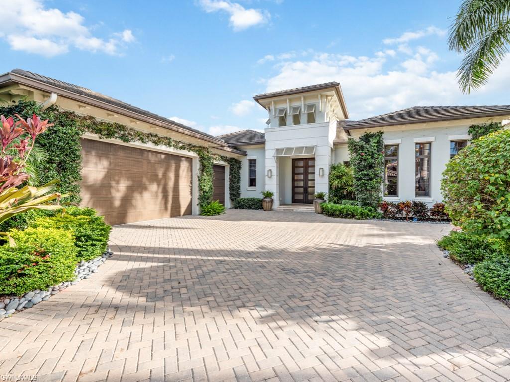 Award-winning interior design distinguishes this waterfront 3-bedroom, 3 1/2-bath home with a library/study encompassing nearly 4,200 sq ft under air. Located in Murano at Miromar Lakes Beach & Golf Club the home is offered fully furnished. The great room plan incorporates a soaring beamed ceiling, fireplace, bar with glass-walled wine tasting room. The gourmet kitchen, features a large peninsula island, Wolf/Subzero appliances and a walk-in pantry. The adjacent dining area overlooks the outdoor living space. Sliding doors in the dining and living room fully pocket providing a seamless transition to the outdoors. A multifunctional outdoor living design features space for relaxing in front of the fireplace and another area for dining that centers on a full outdoor kitchen. A custom resort-style pool with fire bowls overlooks the lake and private dock. The master suite includes his-and-her walk-in closets, dual vanities, an oval tub and walk-in shower. French doors in the master bedroom sitting area open to the lanai. Two additional bedrooms have en suite bathrooms and walk-in closets. Must-see the fine features, custom design and elegant finishes that create one-of-a-kind luxury.