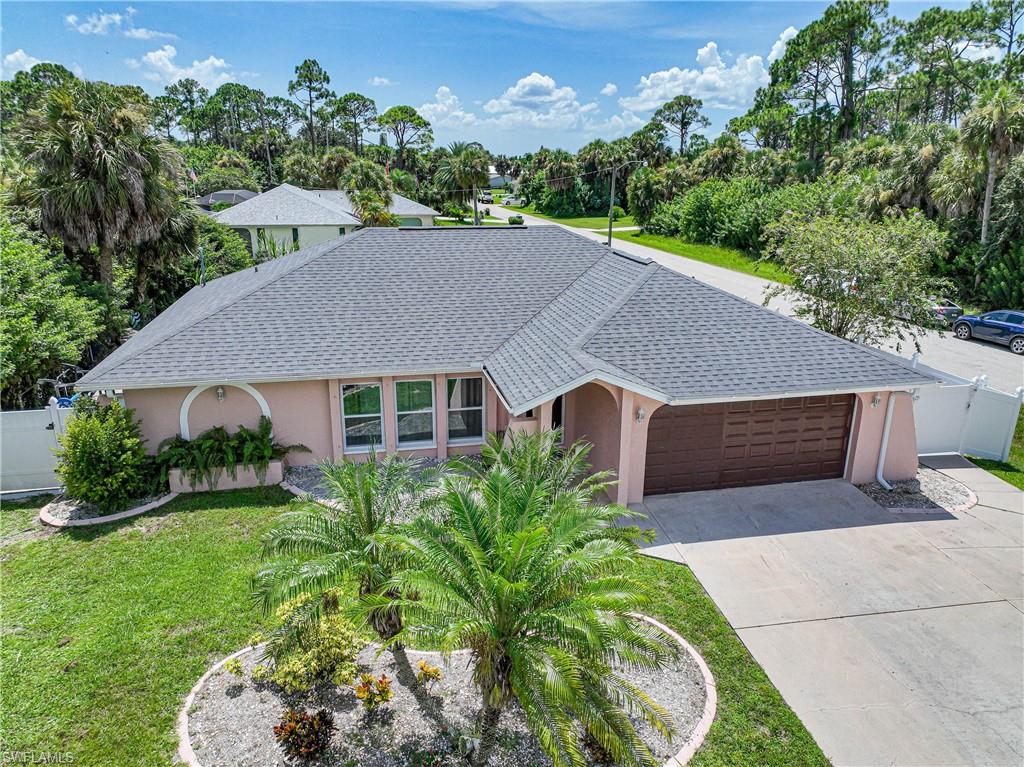 This spacious four-bedroom, three-bathroom home features all you need for a family and is nestled on a fully fenced oversized corner lot in South Port Charlotte. This home offers an abundance of private outdoor entertainment space.
The screened salt water pool and covered lanai with pass-through window to the kitchen are perfect for a gathering of any kind, while inside offers and open and expansive living and dining area.
In 2018, this home was renovated with new appliances, AC, water heater, septic, laminated flooring and the pool was resurfaced; in 2019 the pool deck was refinished and in 2020 new pool pump and a brand new roof was installed.
The garage was converted to a in law suite/Master suite with a kitchenette and a wall AC unit. And if you need space for storage, you can use the 6x8 and the 8x10 sheds.
Excellent location near the waterways, quick access to the public boat launch on Edgewater Drive or the public beach and recreation area at Port Charlotte Beach Park.