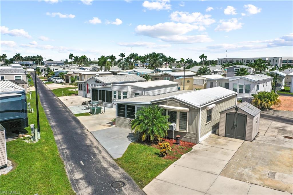 SELLER SAYS BRING ALL OFFERS!! Discover unbeatable value just minutes from the sandy shores of Fort Myers Beach and Sanibel Island! This charming one-bedroom, one-bathroom manufactured home offers 408 square feet of interior living space, plus an attached 328-square-foot space that provides incredible versatility. Whether you're looking to create a second bedroom, a spacious workshop, home office, or extended living area, this additional space offers endless potential to suit your needs. Perfect for year-round residents, seasonal snowbirds, or investors, this home is located in a pet-friendly, non-age-restricted community known for its welcoming atmosphere, active lifestyle, and very low monthly dues. Holiday Condo Inc boasts a wide range of resort-style amenities, including both an indoor and outdoor pool, a relaxing sauna, pickleball and tennis courts, shuffleboard, bocce ball, and horseshoes. The community is vibrant and social, with regular activities and events that make it easy to meet neighbors and enjoy the Florida lifestyle to the fullest. This home offers the perfect blend of comfort, value, and location. Don’t miss your chance to own a slice of paradise at an unbeatable price!