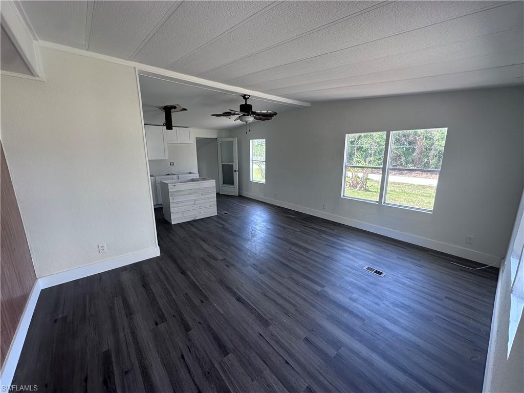 BRING ALL OFFERS! Fully renovated manufactured home in beautiful Punta Gorda right off of N. Tamiami Trail, 2 miles from I 75. This 2+Den home boasts new laminate flooring, custom cabinets, choose your granite counter tops, Stainless steel appliances and more. Centrally located mins from downtown Punta Gorda. 2 Miles from I75