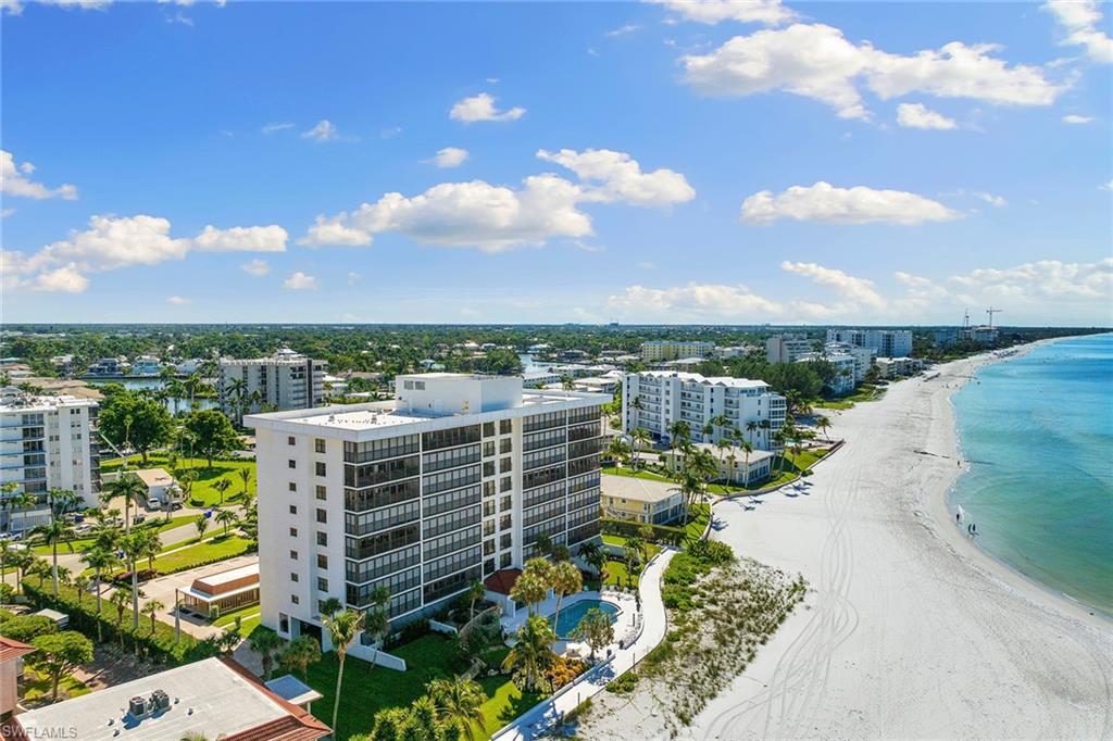 Direct front-row Gulf views take center stage in this three bedroom, three bath end-unit at Gulf View Beach Club, positioned on the south end of the building with sweeping west-facing Gulf and beach views and spectacular sunsets. This light-filled floor plan features an expansive great room opening to a screened, covered Gulf-front balcony, creating an ideal backdrop for coastal living and entertaining. A second, east-facing balcony invites refreshing front-to-back breezes. The generous primary suite enjoys Gulf views and balcony access, while two guest suites each feature en-suite baths. This residence presents an exceptional opportunity to customize and create your ideal beachfront retreat in one of Naples’ premier coastal settings. Gulf View Beach Club has one of the most desirable beachfront locations south of Doctor’s Pass, and is an intimate building with just 32 residences, offering direct beach access, a beachfront pool and patio, social room, fitness center, on-site manager, individual storage rooms, paddleboard and kayak racks. Just minutes from luxury shopping and fine dining of downtown Naples, this is beachfront living at its finest.