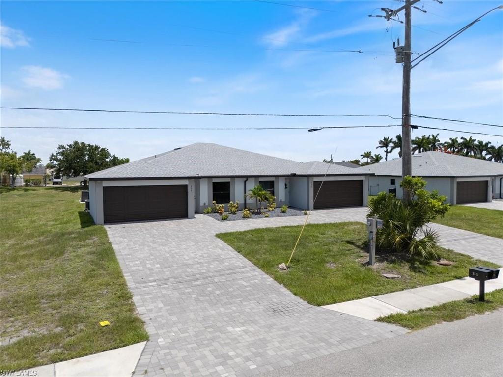 Welcome to this waterfront Duplex located at 333-335 SW 47th Terrace in the heart of Cape Coral. One of a kind  duplex with two private heated, salt water pools on a GULF access canal! Situated on an oversized, corner lot that has potential to build a RV garage. This unique Duplex has everything included and is perfect for short term rentals, multi-generational or if you are looking to live in one side and rent out the other side. Each side has 3 bedrooms, 2 bathrooms and 2 car garages. High ceilings in each great room. The property's prime location places you minutes away from Cape Coral's best shopping, dining, and entertainment, as well as a short boat ride to world-class fishing and open waters. Includes impact windows and doors. Whether you're an investor looking to expand your portfolio, a boater seeking waterfront convenience, or someone who wants the option to live in one unit while generating income from the other, this property is a unique and versatile find. Schedule your showing today to explore everything this corner lot, waterfront duplex has to offer!