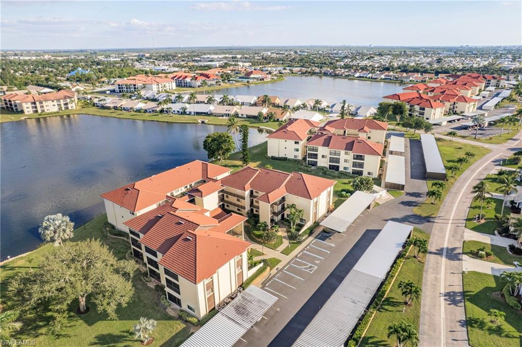 Enjoy peaceful, panoramic lake views from this beautifully updated third-floor condo in the highly sought-after Cinnamon Cove community. Bright, welcoming, and move-in ready, this residence features a brand-new A/C system and upgraded attic vent insulation installed in February 2025, fresh interior paint, newer kitchen appliances (2023), and all-new furnishings throughout. The thoughtfully designed floor plan offers one bedroom, 1.5 baths, and an open living area that flows effortlessly to the screened lanai. Eastern exposure fills the space with gentle morning sunlight, creating the perfect spot to relax with your coffee while taking in beautiful sunrise views over the water. Hurricane shutters and lanai sunshades provide additional comfort, convenience, and year-round protection. Nestled within the gated, amenity-rich Cinnamon Cove community, residents enjoy an active and engaging lifestyle supported by a full-time activities director. Community amenities include multiple pools, a clubhouse, hot tub, fitness center, tennis courts, pickleball, bocce, and shuffleboard, along with a packed calendar of social events, dinners, entertainment, and clubs. Combining tasteful updates, scenic lake views, and an exceptional community atmosphere, this condo presents a fantastic opportunity in a prime location. Schedule your private showing today—this one is not to be missed.