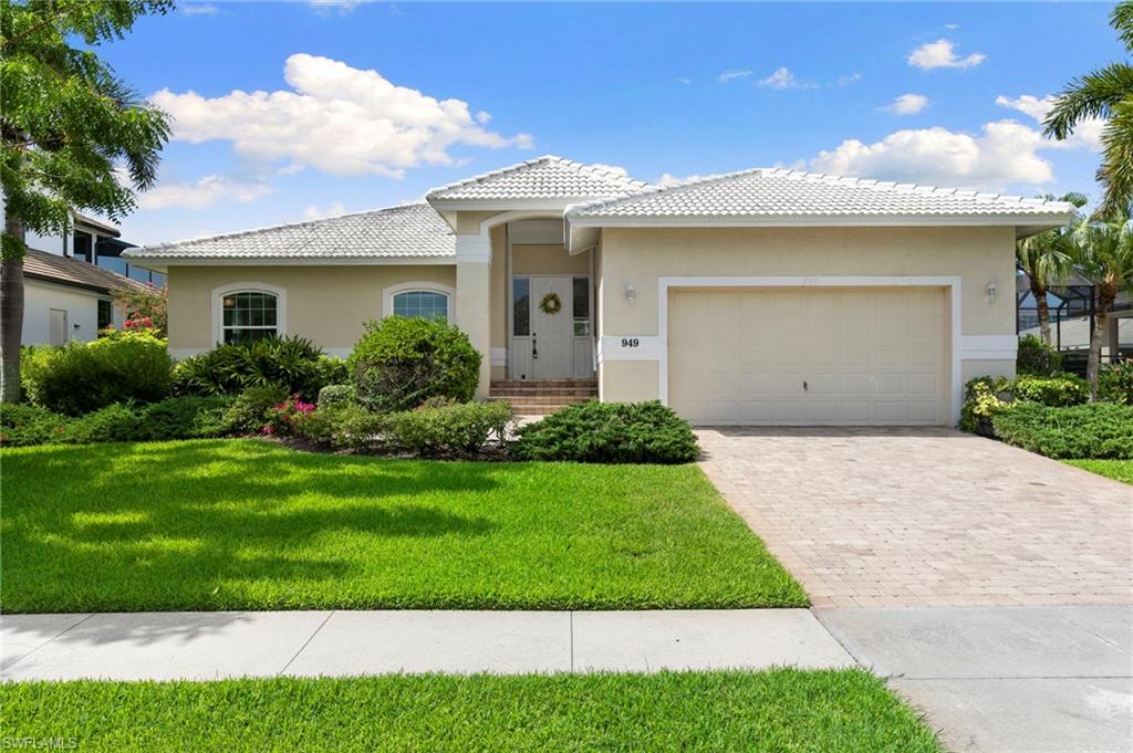 Wake up to warm sunshine, spend your afternoons lounging by your private swimming pool, and embrace the effortless island lifestyle that makes Marco Island so desirable. This well-maintained 3-bedroom, 2-bathroom home offers comfortable living space, thoughtfully designed for everyday living, seasonal enjoyment, or investment potential. Positioned on a generous lot with highly sought-after southern exposure, the property features a rare 150-foot-deep backyard, creating an exceptional sense of privacy and ample space for outdoor entertaining, gardening, or simply relaxing in your own tropical retreat. The screened pool area provides the perfect setting to enjoy Southwest Florida's year-round sunshine.
Ideally located just minutes from Marco Island's world-famous white-sand beaches, the JW Marriott, boutique shopping, waterfront dining, marinas, golf, parks, and endless recreational opportunities, this property places the best of island living within easy reach.