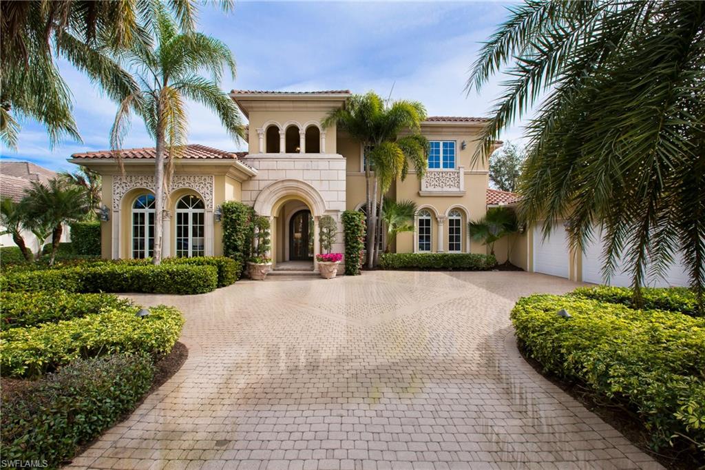H.12697 - Wow!! Move right in to this spectacular estate home. Professionally staged by Merridith Baer Homes. Wrought iron doors open to great room with soaring ceilings, stone floors and 2-story fireplace. Huge gourmet kitchen with double islands, pantry, butlers pantry/bar, granite and custom cabinetry.  Family room with custom media center opens “L” shaped sliders to covered lanai. Access pool bath, summer kitchen and dining space all from the family room. Luxurious office with built-ins and hardwood floors. Owners suite highlighted by hardwood floorings, tray ceilings, sitting area and his/her baths. Upstairs 2 additional guest suites with private en-suite baths, large closets, bonus loft area and morning bar. Outside the views can’t be beat from the screened pool area. Long sweeping views of the fairways and lakes. Fabulous outdoor area to enjoy the Florida lifestyle!
