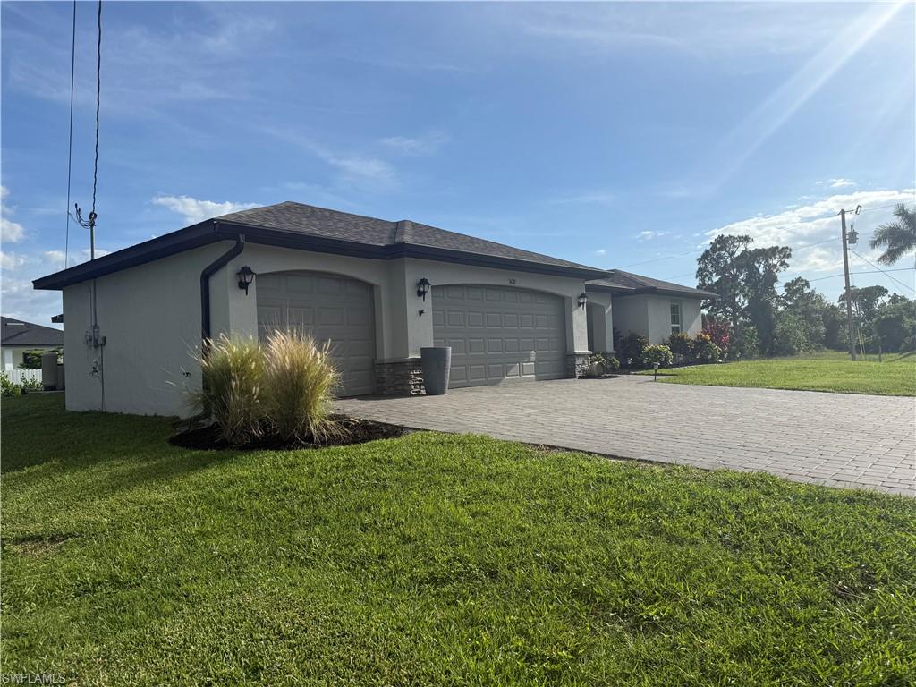 FULLY FURNISHED and move-in ready! Why wait months to build when you can own this beautifully maintained, like-new home loaded with upgrades in one of the most desirable and fastest-growing areas of Northwest Cape Coral.Ideally located near Old Burnt Store Road, this property is just minutes from the highly anticipated Seven Islands development and the new Tropicana Waterfront Park, placing you at the center of Cape Coral’s exciting future growth.This thoughtfully designed home features a spacious 3-car garage with durable epoxy flooring, granite countertops throughout, shaker-style cabinetry, stainless steel appliances, and a luxurious primary suite complete with dual sinks and a frameless glass shower enclosure. Additional upgrades include new landscaping, a large paver driveway, a screened lanai perfect for relaxing or entertaining, and a newer A/C unit for added comfort and efficiency.Situated on an oversized corner lot, there is plenty of room to add your dream pool while still enjoying ample outdoor space. Whether you’re looking for a full-time residence, seasonal retreat, or investment opportunity, this home offers exceptional value, location, and convenience.

Schedule your private showing today—this is a home you won’t want to miss!
