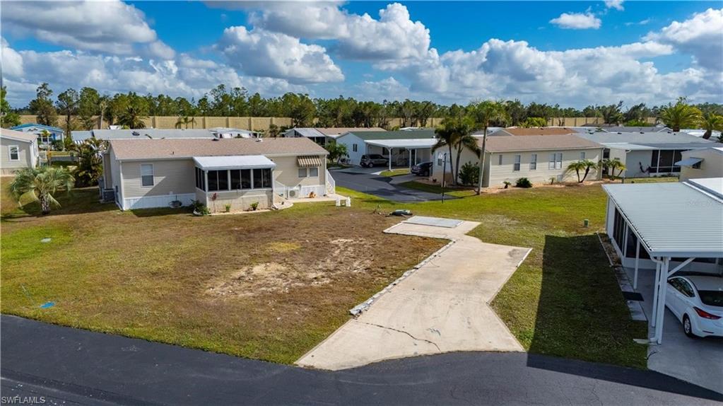 Port Charlotte Village was Voted #1 Manufactured home Community for 2024! **NOT IN A FLOOD ZONE** Situated in a highly sought-after 55+ manufactured home community with a low HOA, this cleared and ready-to-use lot is the perfect foundation for your new home. Located outside any flood zone for peace of mind, the property boasts a concrete driveway and full electric hookups, ensuring convenience and readiness for development. A durable concrete slab is already in place, offering versatile options to add a cozy lanai or a functional shed to suit your needs. Positioned in a peaceful and private area of the community, the lot is adjacent to the scenic greenbelt trail, providing a serene natural backdrop for daily enjoyment. This vibrant community combines tranquility with convenience, being just minutes from excellent shopping, diverse entertainment options, delicious dining, top-tier golf courses, and Florida’s world-renowned blue beaches. Whether you’re envisioning a seasonal retreat or a full-time residence, this lot offers the ideal location to bring your vision to life. Don’t miss this opportunity to be part of a welcoming and active community in a prime Florida location!"
