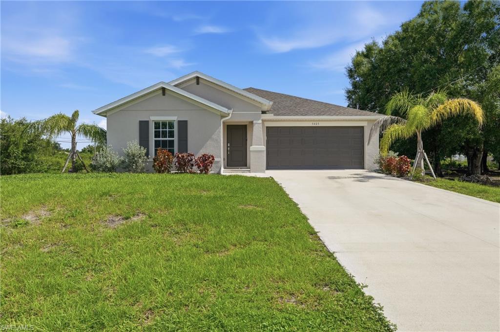 Why wait to build when you can start collecting rent from day one? Built in 2024 and already tenant-occupied, this beautifully designed 3-bedroom, 2-bath residence offers the perfect blend of modern living and immediate investment potential. Situated on a desirable corner lot, this home delivers the advantages of new construction without the uncertainty, delays, or added expenses that often come with building from scratch. Inside, you'll find a bright, open-concept layout with contemporary finishes, spacious living areas, and a stylish kitchen featuring stainless steel appliances designed to make everyday living effortless. The thoughtful floor plan creates a seamless flow between living, dining, and entertaining spaces, while the two-car garage adds valuable storage and convenience. Beyond the property itself, Lehigh Acres continues to attract buyers and investors seeking affordability, growth, and opportunity. With expanding development throughout Southwest Florida, convenient access to Fort Myers, nearby shopping, dining, parks, and major roadways, the area remains one of the region's most compelling places to invest for both current income and future appreciation. Whether you're looking to expand your portfolio or secure a newer home in a growing market, this property offers a rare combination of modern construction, established tenancy, and long-term potential.