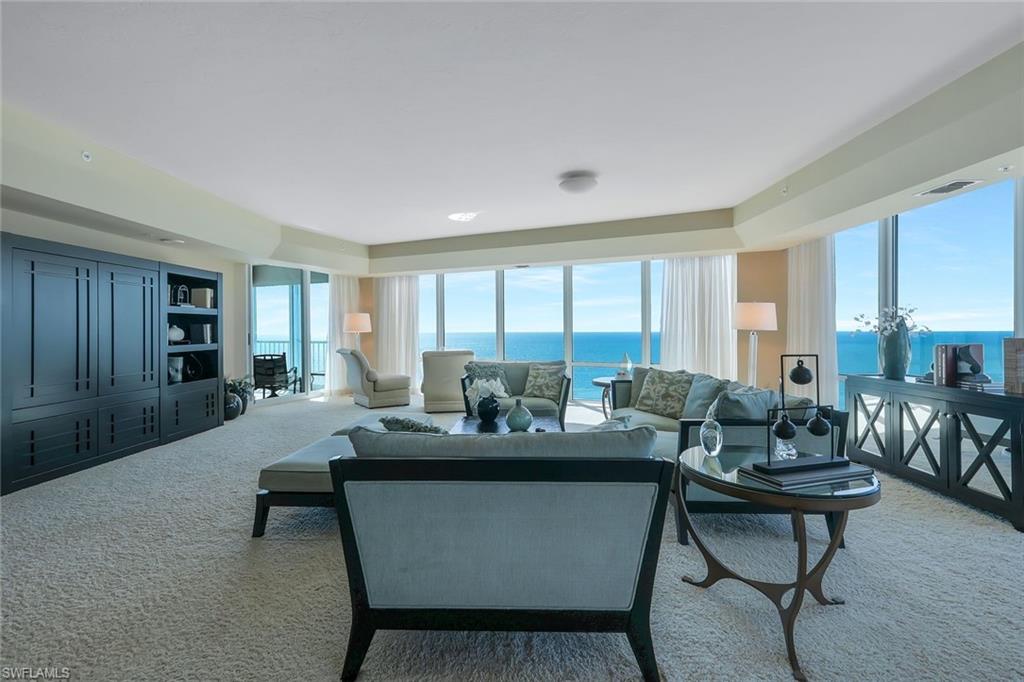 Discover this one-of-a-kind condo offering panoramic views of the pristine sugar-sand beaches of Naples and the shimmering Gulf of Mexico. Imagine waking up to sweeping vistas and watching dolphins play from your screened balcony and nearly every room of your home. This spacious condo features a versatile floor plan, giving you endless options for personal design and finishing touches to create your perfect haven. The kitchen is a centerpiece of functionality and elegance, complete with a large island and a cozy breakfast area that overlooks the captivating beachfront. Retreat to the updated master bathroom, designed to provide a spa-like atmosphere, with its luxurious shower and separate soaking tub, ensuring relaxation after a long day. Located within walking distance to the vibrant Venetian Village, you'll have easy access to shopping, dining, and entertainment, making this condo a perfect blend of luxury and convenience in the heart of Naples. Don't miss out on the opportunity to own this exceptional property!