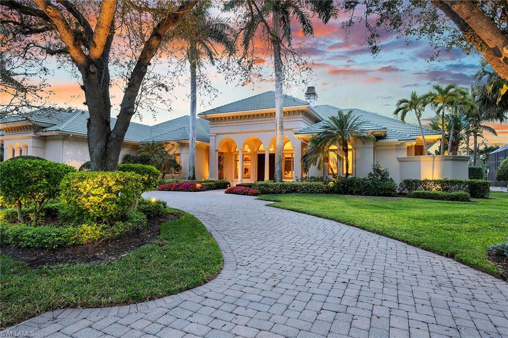 Sun-sensational views of unique infinity pool and spa area encompass entire width of home. This expansive area offers multiple sitting venues and is the ideal spot to relax and enjoy lake, preserve and beautiful sunsets. As you enter this exquisitely built home, the open living and dining room greets you, and radiates elegance and comfort. Volume ceilings with quality detail enhance the Ralph Lauren crystal chandelier. A dual-sided fireplace adds warmth. The gourmet kitchen features a large, natural quartzite island with extra storage, Wolf and Miehle appliances, and a true beverage center. A courtyard with fireplace adjacent to kitchen and family room provides additional entertainment area and leads to the summer kitchen complete with grill, wet bar and refrigerator. The spacious owner’s suite is a special retreat for quiet relaxing. Pamper yourself in the soaking tub and well-appointed shower. The king-size walk-in closet with custom cabinets provides ample storage. Double doors open to the outdoors. Guests can enjoy the two en-suite rooms in this split-bedroom plan. You will appreciate this well-maintained, exquisitely built home with designer touches throughout.