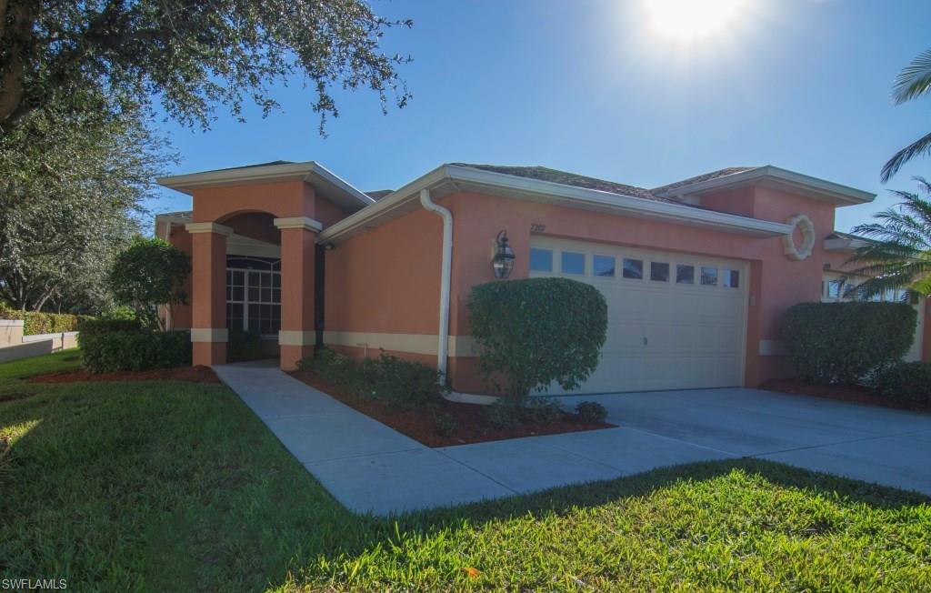 How about living on a golf course without having to live in a gated community?  Your own private sanctuary Villa with plenty of parking and privacy.  Only a short distances to beaches and shopping.  A view of the golf course through a bay window in the eat-in-kitchen, corian counters with wood cabinets, volume ceilings, security system, two car garage, wonderful Den/Office, Main Bedroom with sliders to large screened in lanai, plantation shutters, skylights, electric storm shutters, all appliances including washer and dryer, crown molding throughout the home.  Come see your own piece of paradise.