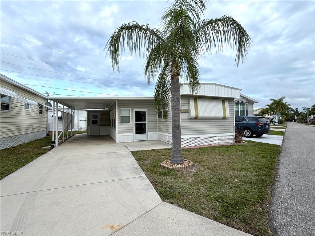 Welcome to your dream cottage retreat, nestled in a vibrant mobile home community where you own the land! This beautifully updated mobile home has new flooring throughout, creating an inviting ambiance that welcomes you. Two living areas and nice open kitchen. Just down the hall is the primary bedroom with lots of closets and a full bath with a large walk in shower.

This cozy residence features two comfortable bedrooms and one and a half baths, perfect for accommodating family or guests. The double-hung windows provide abundant natural light while enhancing energy efficiency. Enjoy the convenience of an attached storage shed for all your outdoor gear and personal items.

Your new home also includes a covered carport, ensuring your vehicle and or boat or both are protected from the elements. This community is an oasis for water enthusiasts, offering a boat ramp and boat slips for easy access to your favorite waterway including the Estero Bay to the Gulf of America.

With its fantastic location near Fort Myers Airport, shopping centers, white sandy beaches, and a variety of restaurants, you’ll be at the heart of all the action. Engage with friendly neighbors while enjoying community activities, take a dip in the nice pool, and build lasting friendships in this welcoming atmosphere.

Please note, this is a pet-free community. Don’t miss the opportunity to make this delightful mobile home cottage your own!